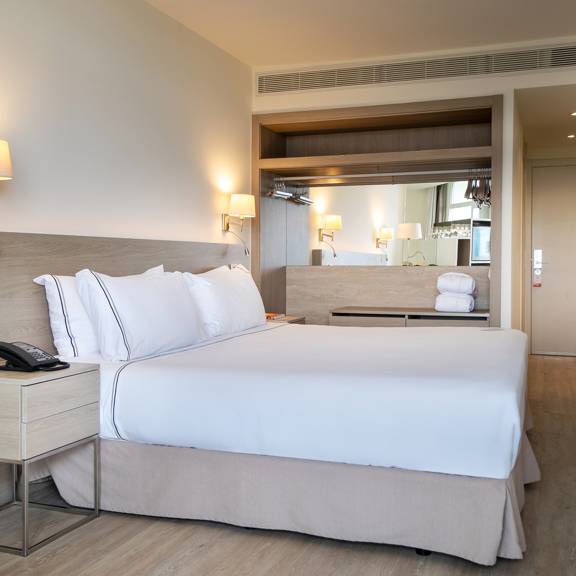 a bed in a hotel room