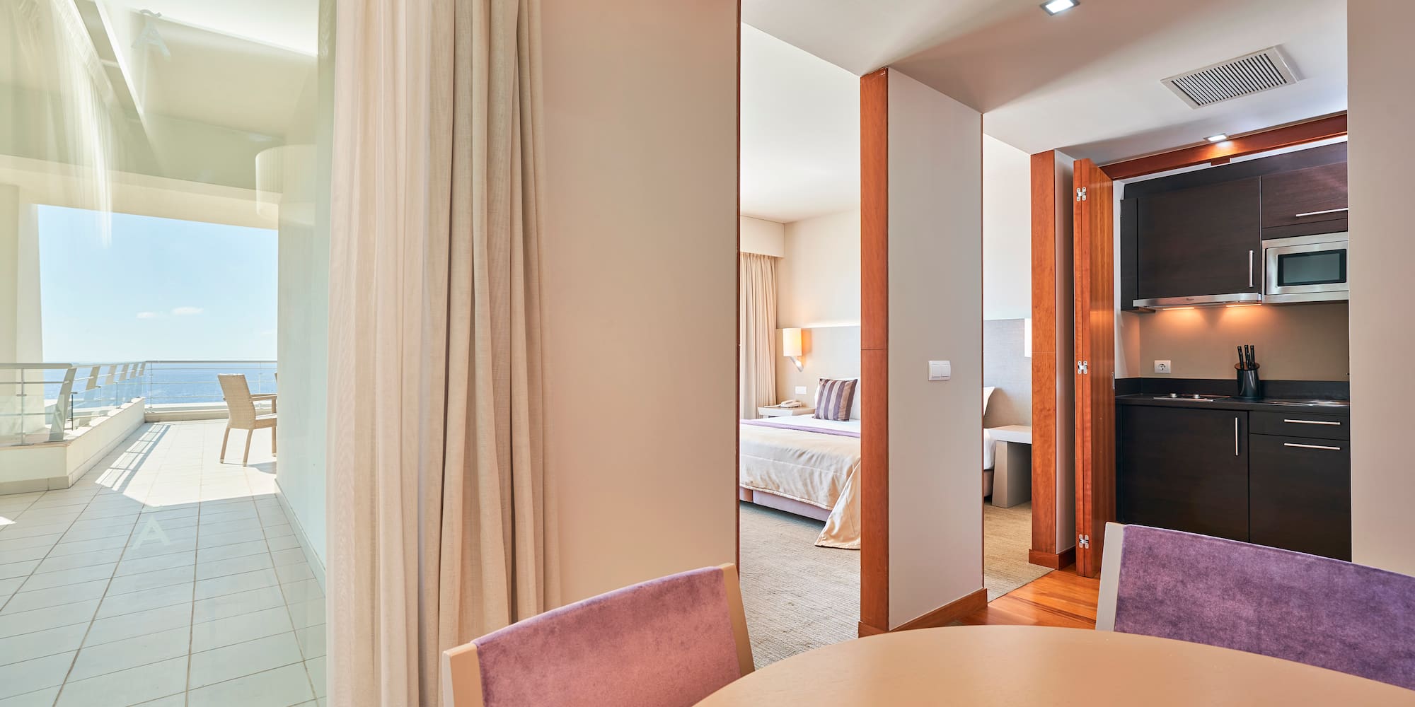 a room with a table and chairs