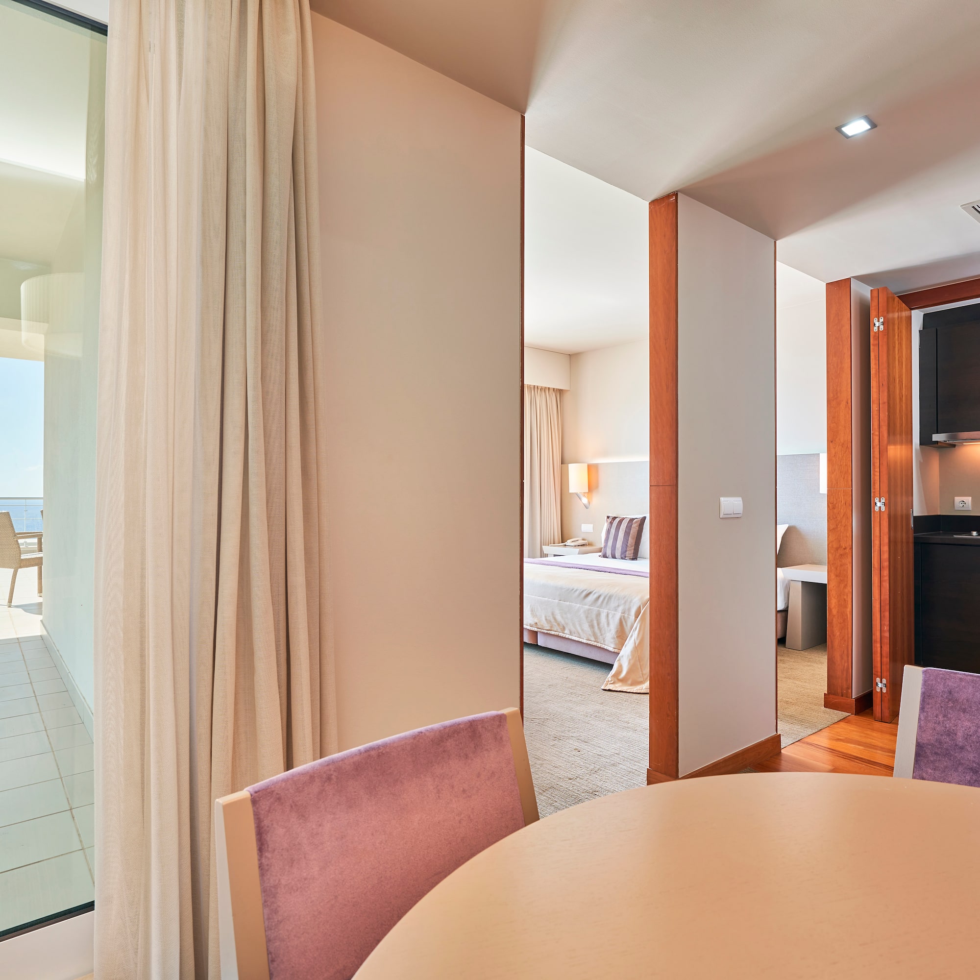 a room with a table and chairs