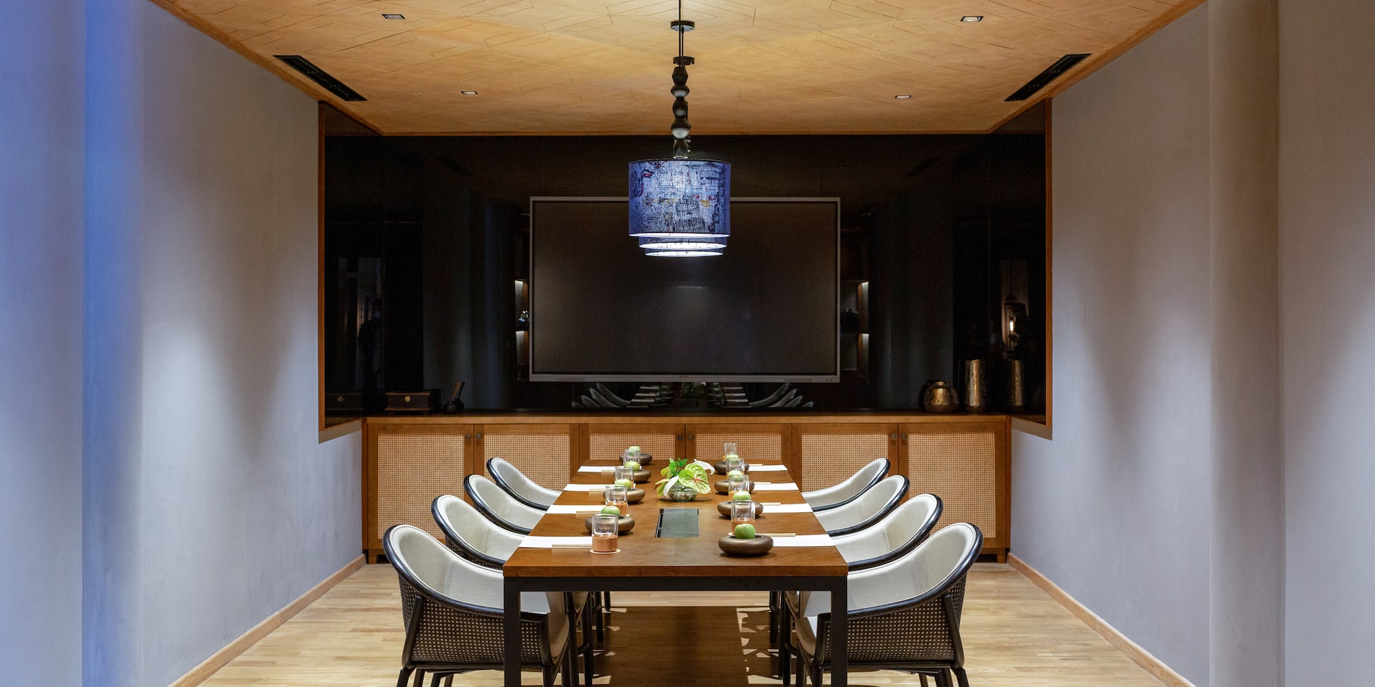 a room with a table and chairs