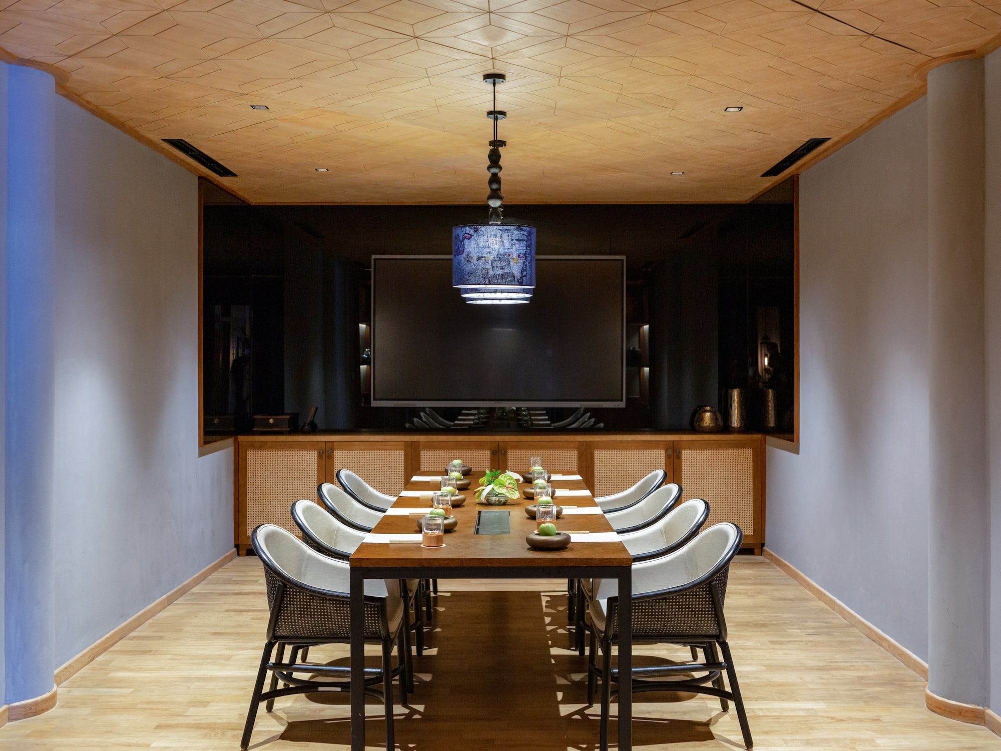 a room with a table and chairs