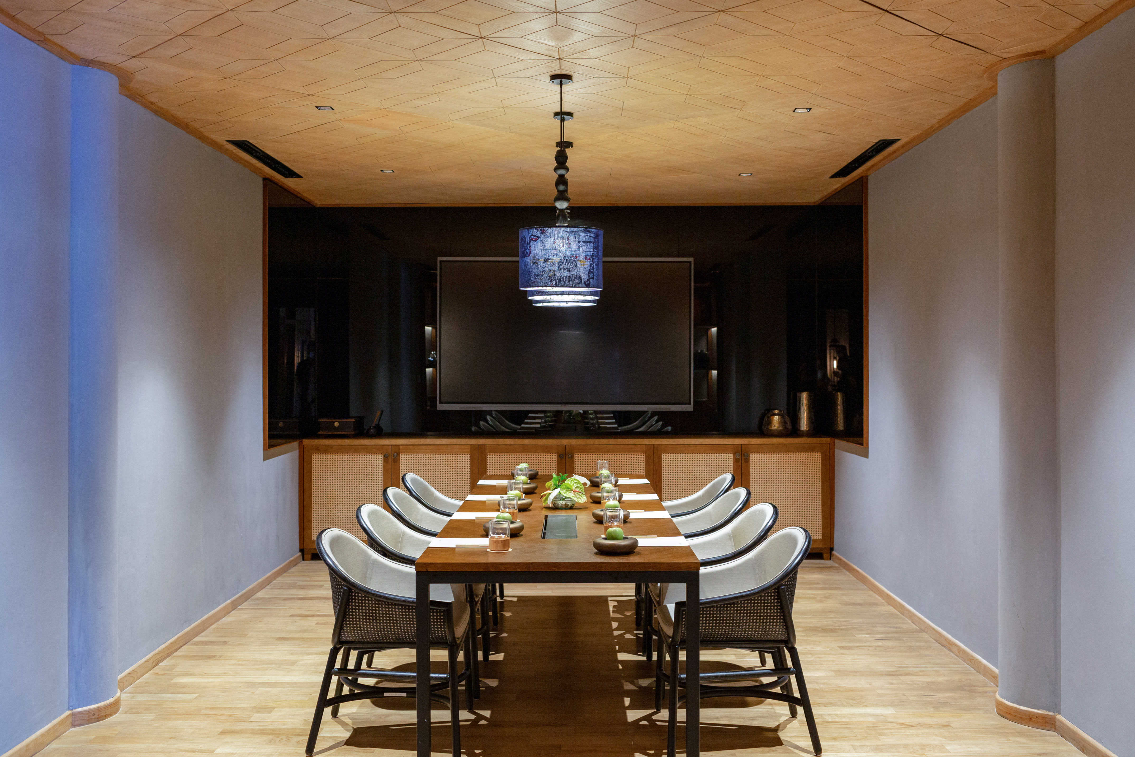 a room with a table and chairs