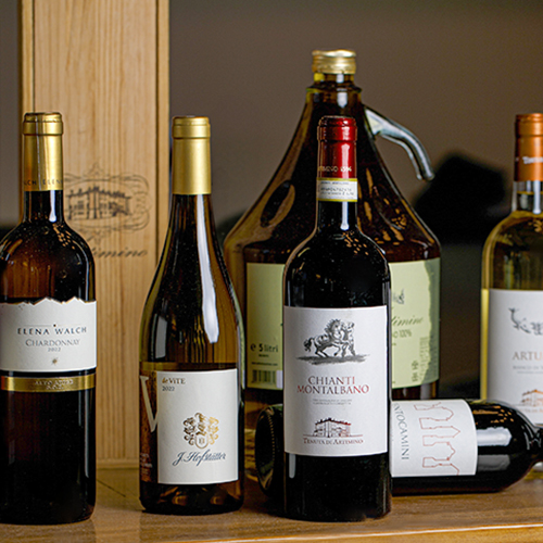 a group of wine bottles on a table