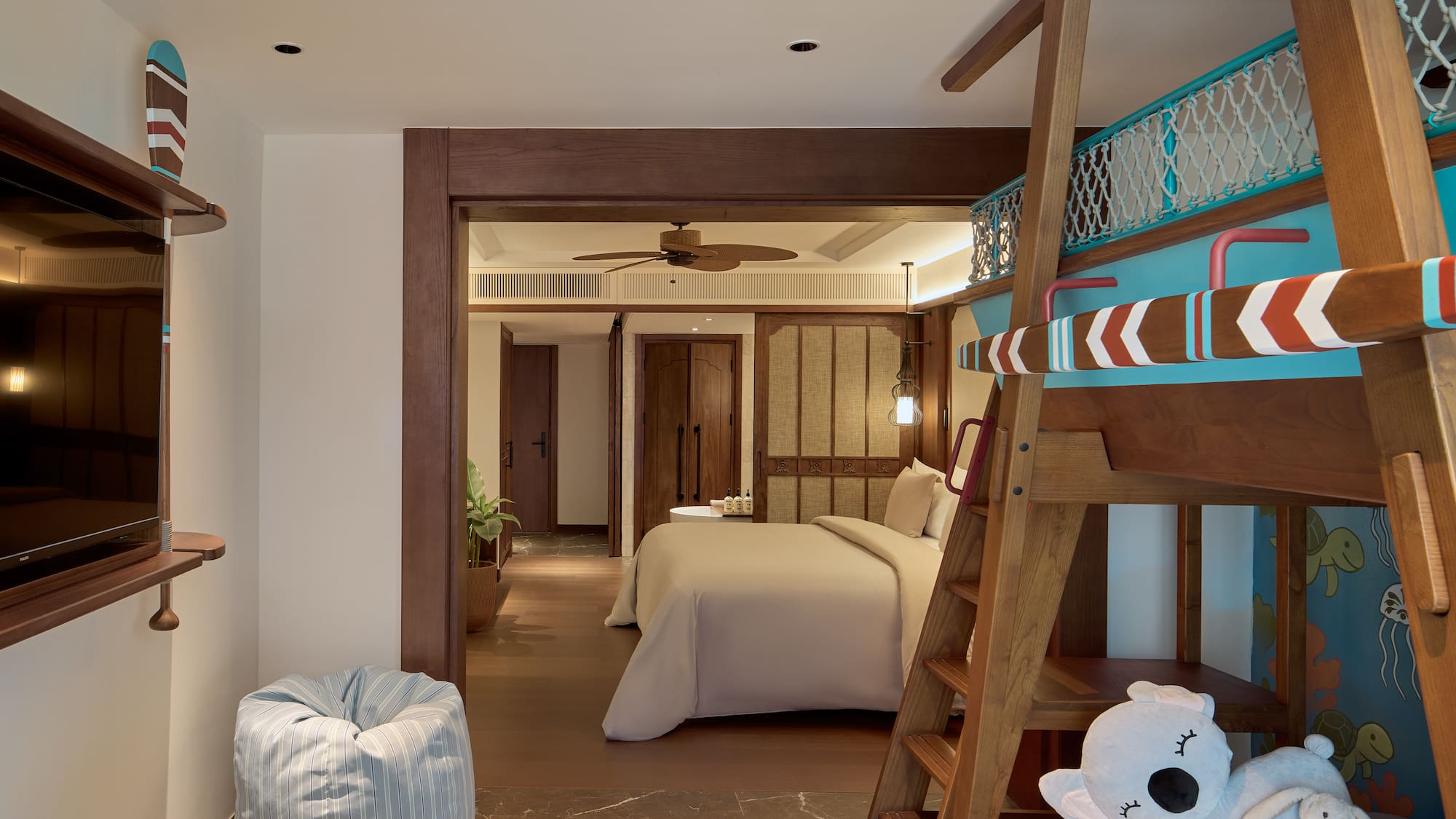 a room with a bed and a bunk bed