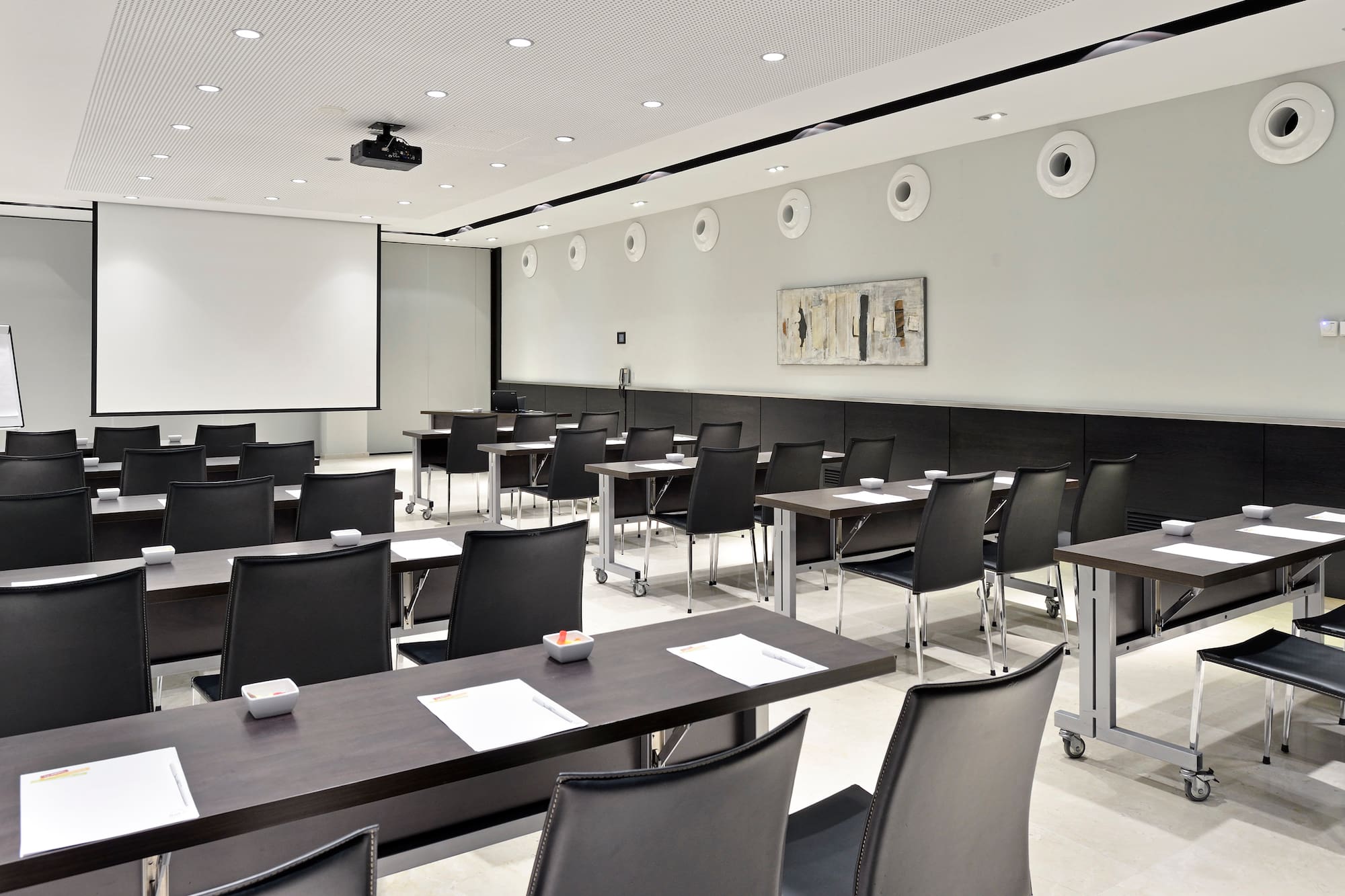 a room with tables and chairs