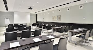 a room with tables and chairs