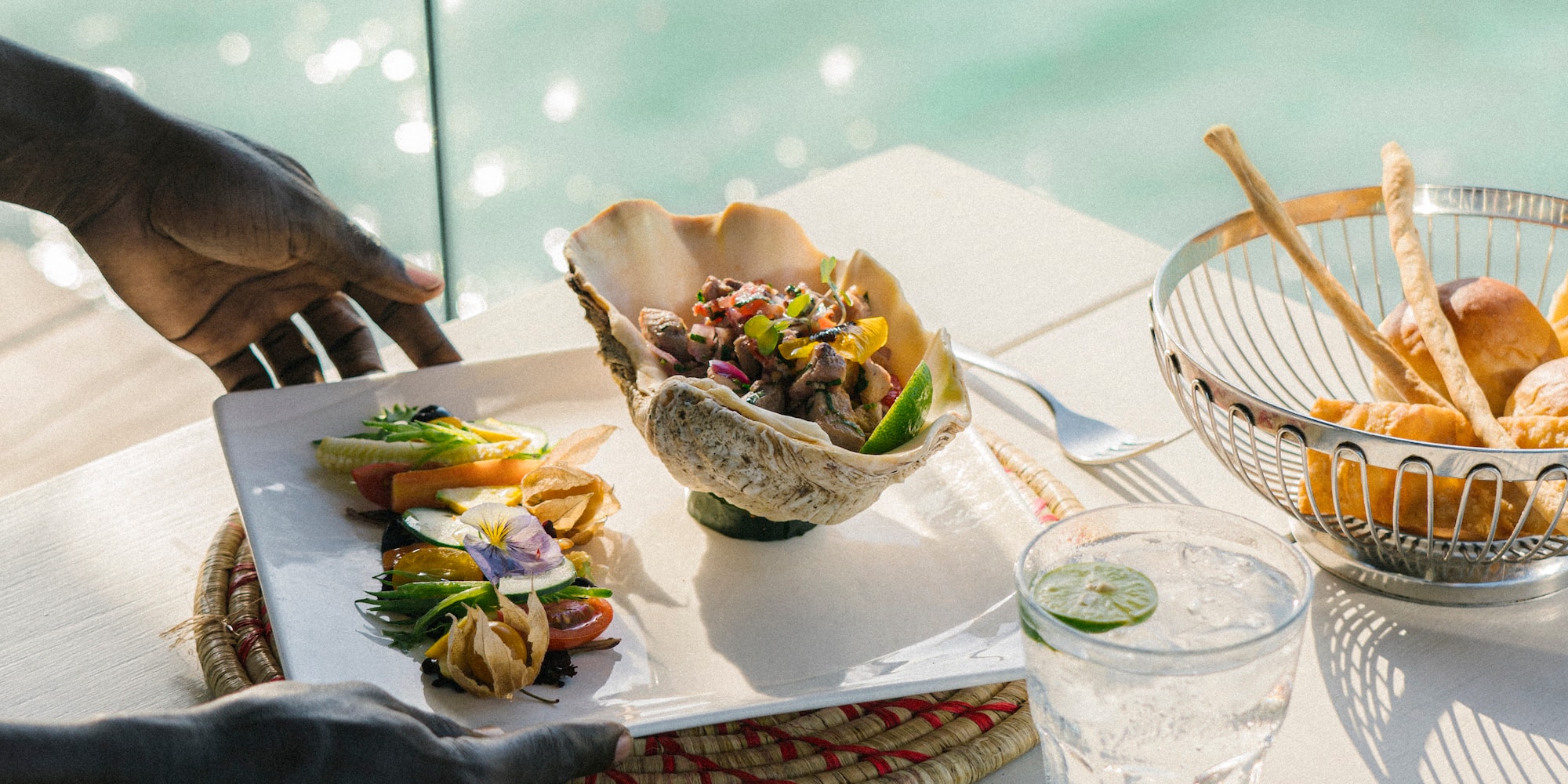 a person serving food on a table