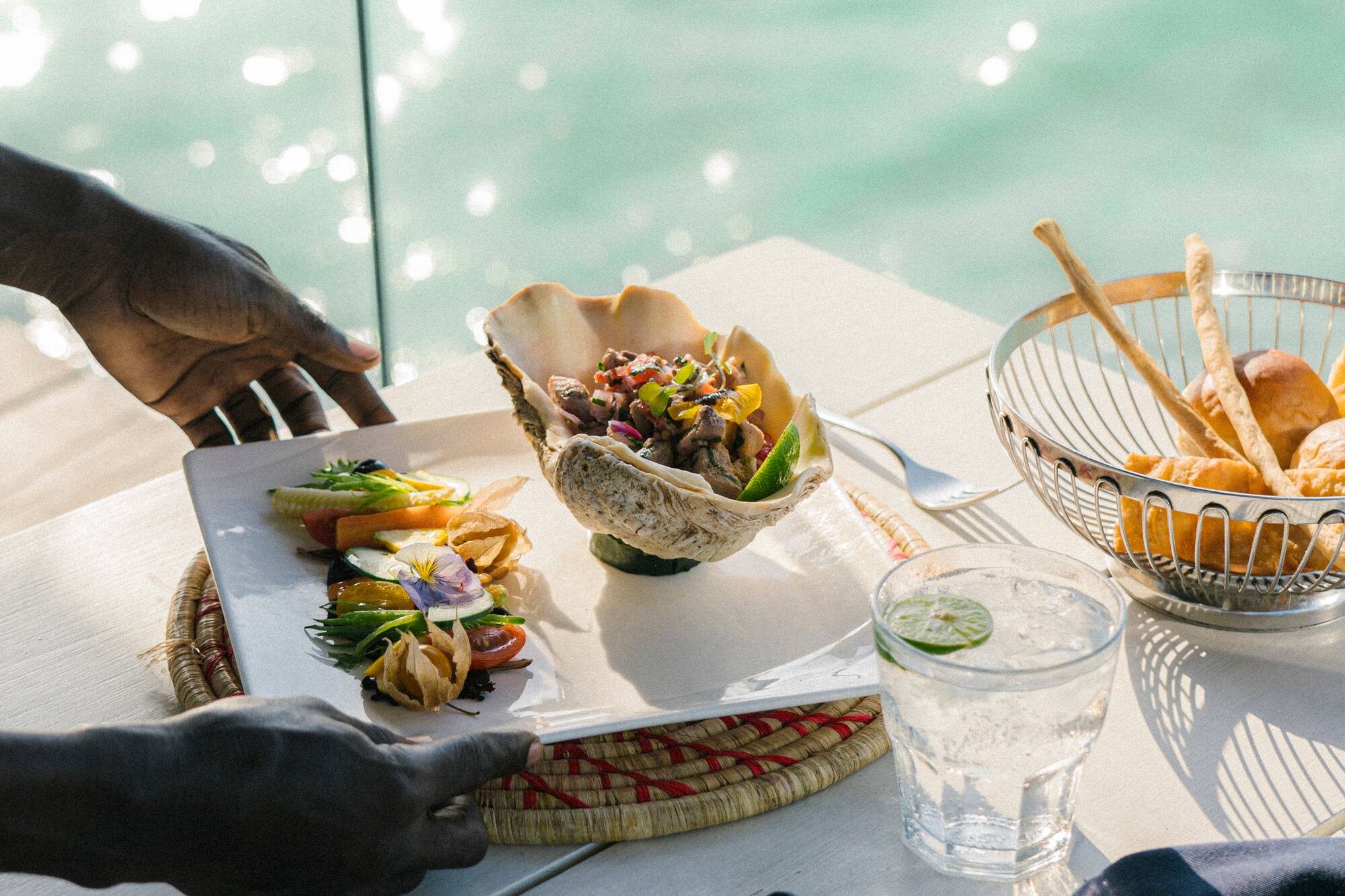 a person serving food on a table