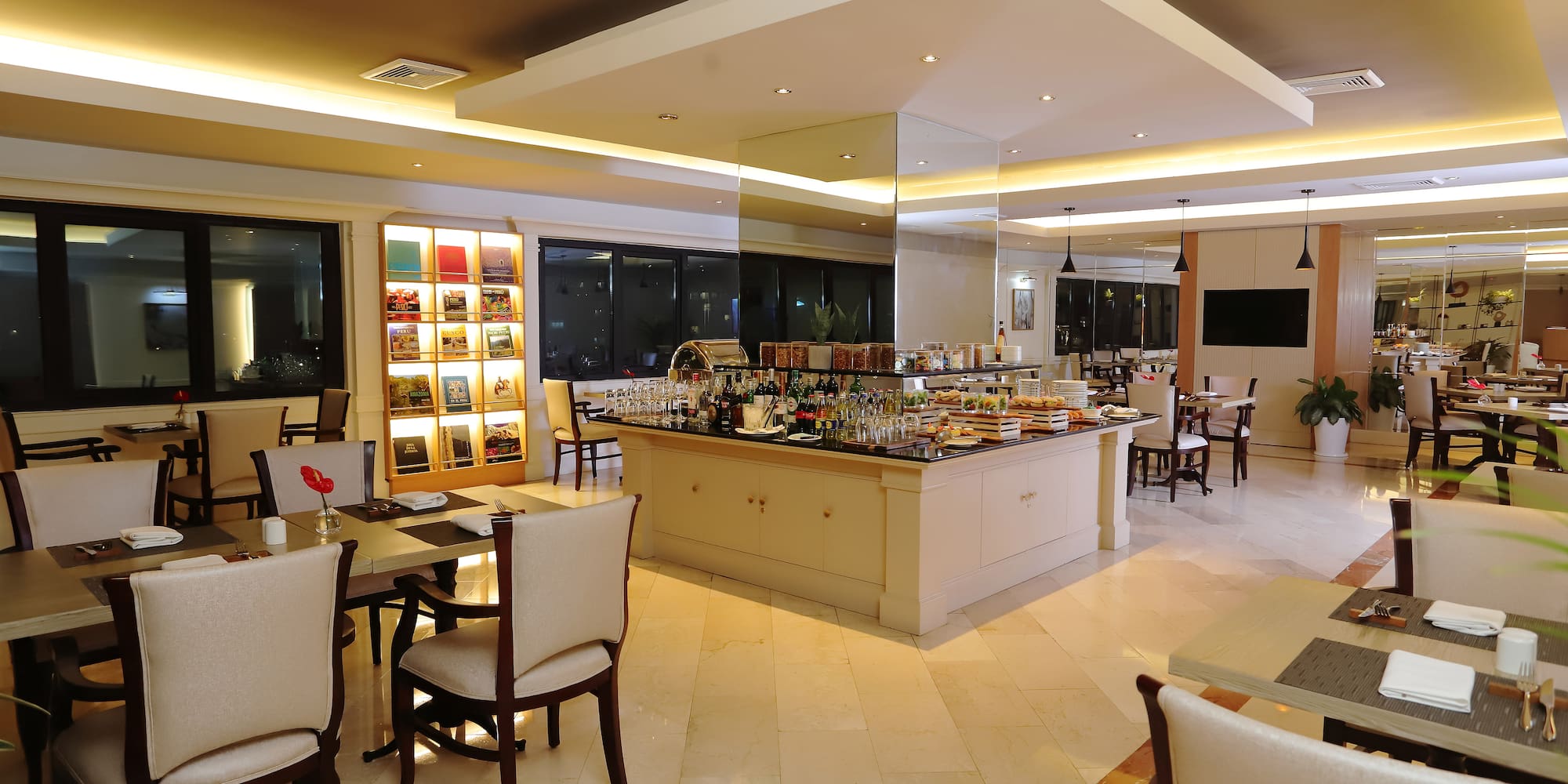 a restaurant with tables and chairs