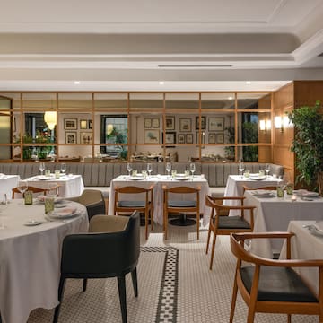 a room with tables and chairs