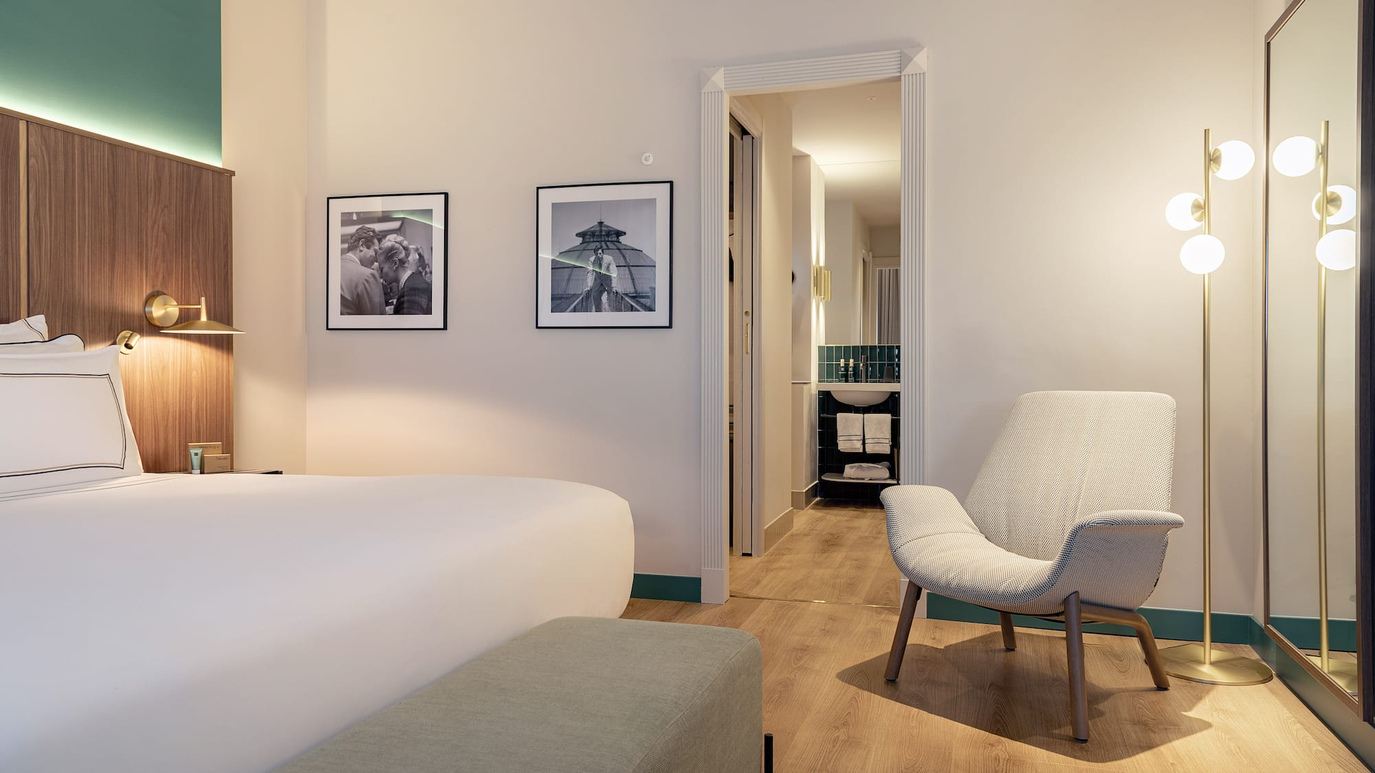 a room with a bed and a chair