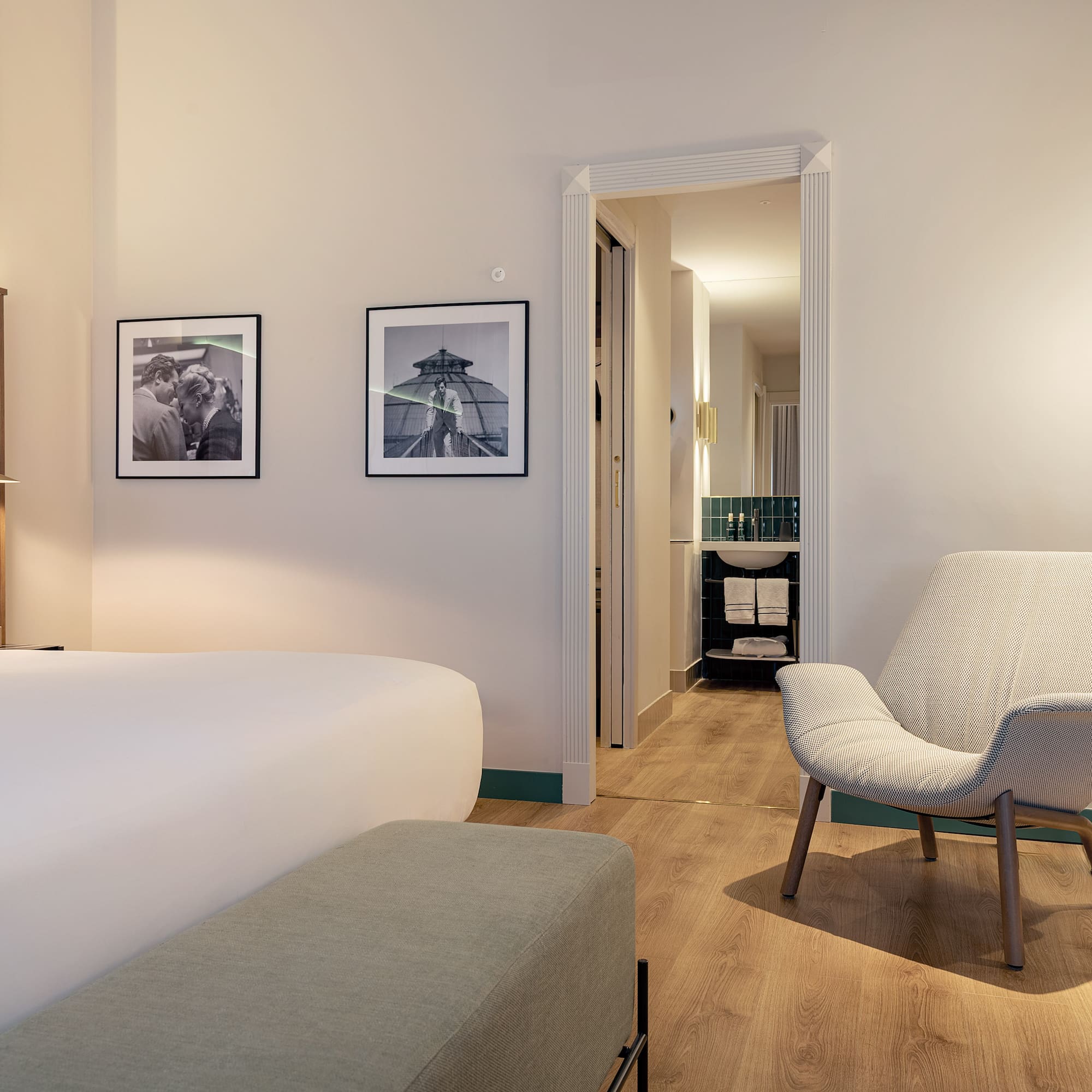 a room with a bed and a chair