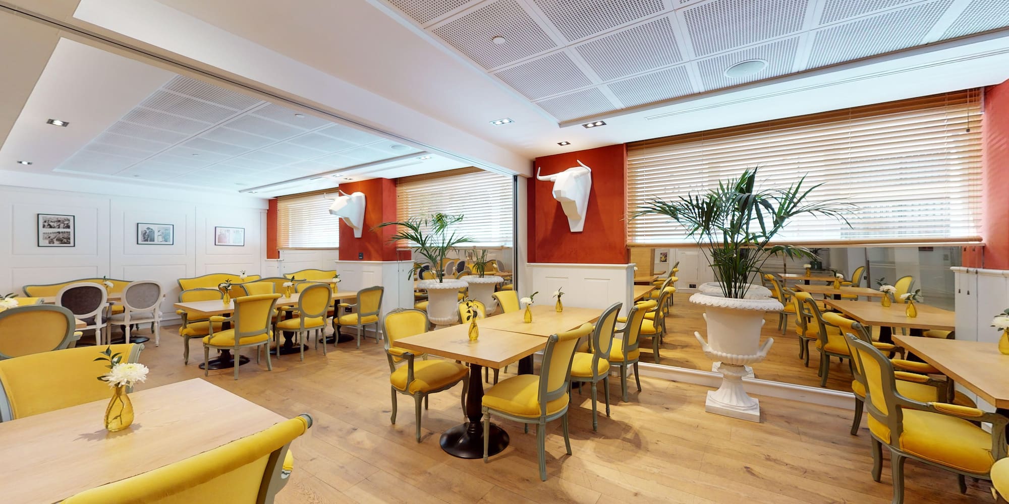 a room with tables and chairs