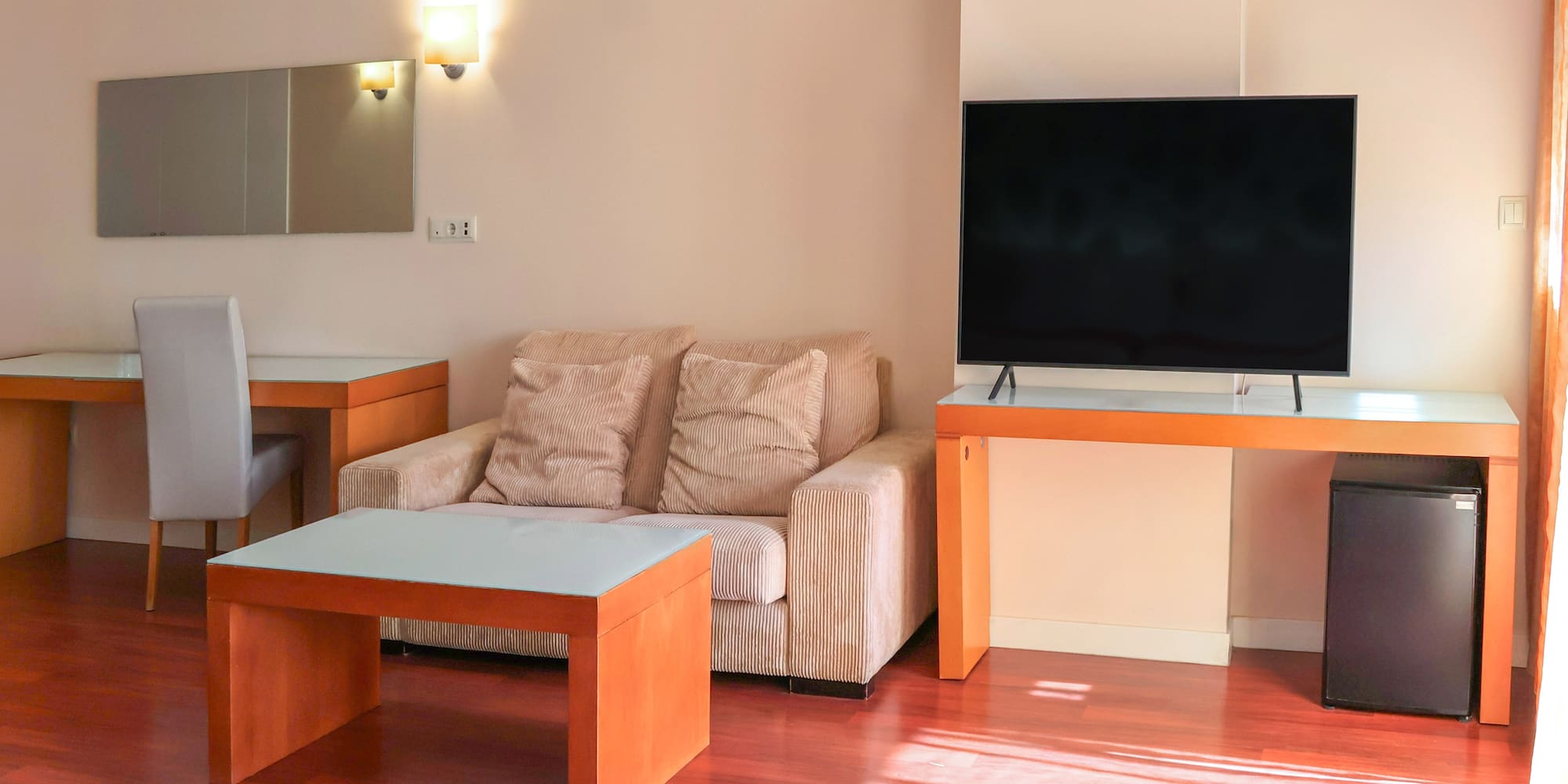 a living room with a couch and a table