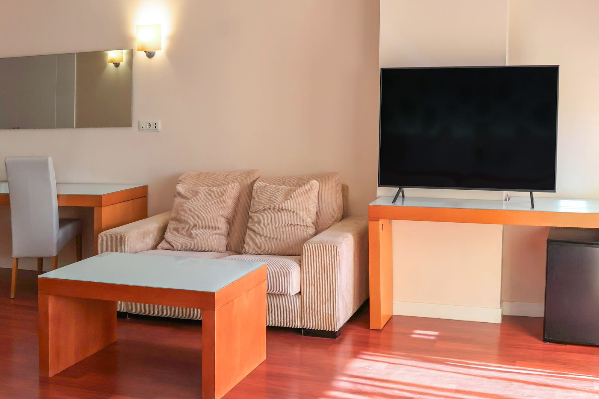 a living room with a couch and a table