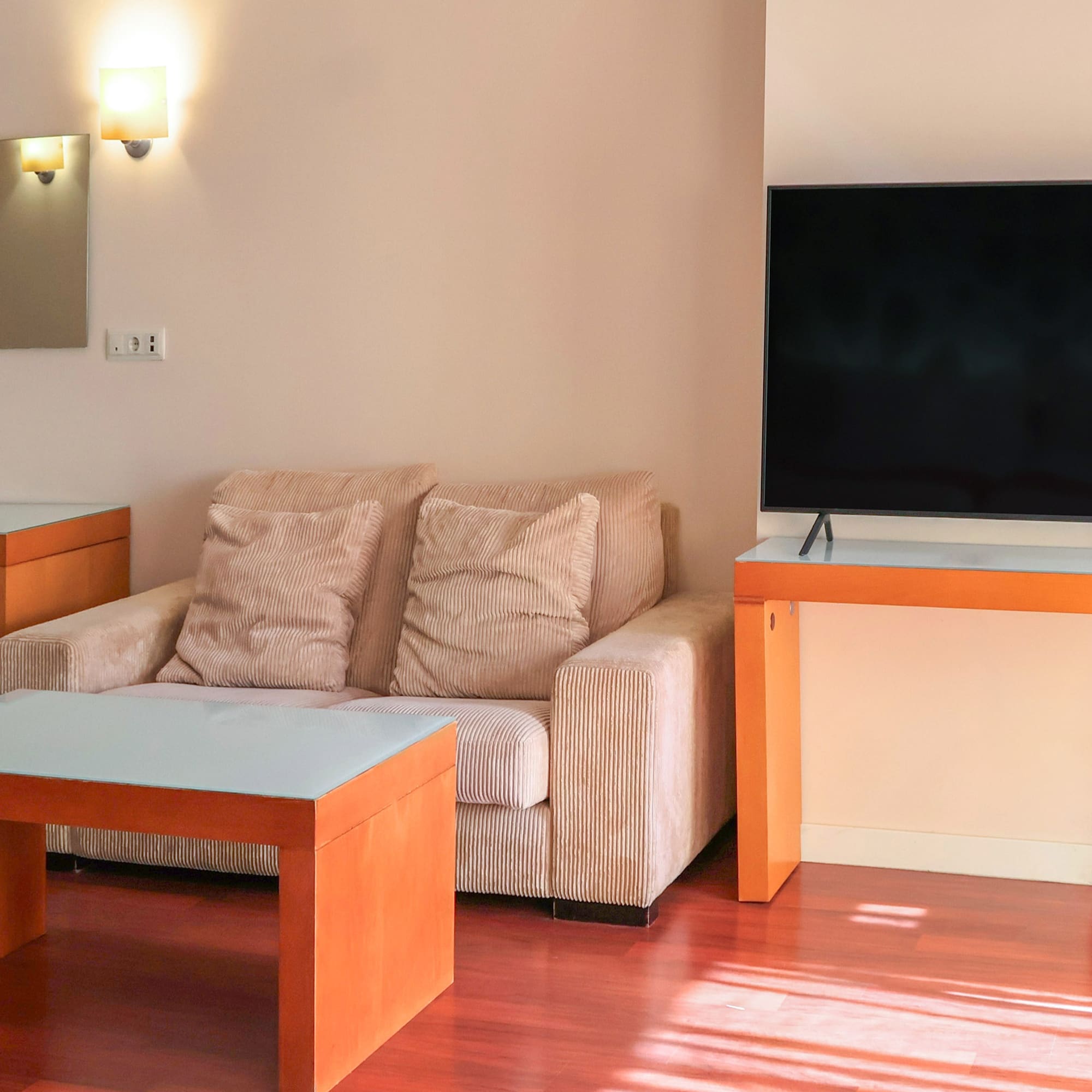 a living room with a couch and a table