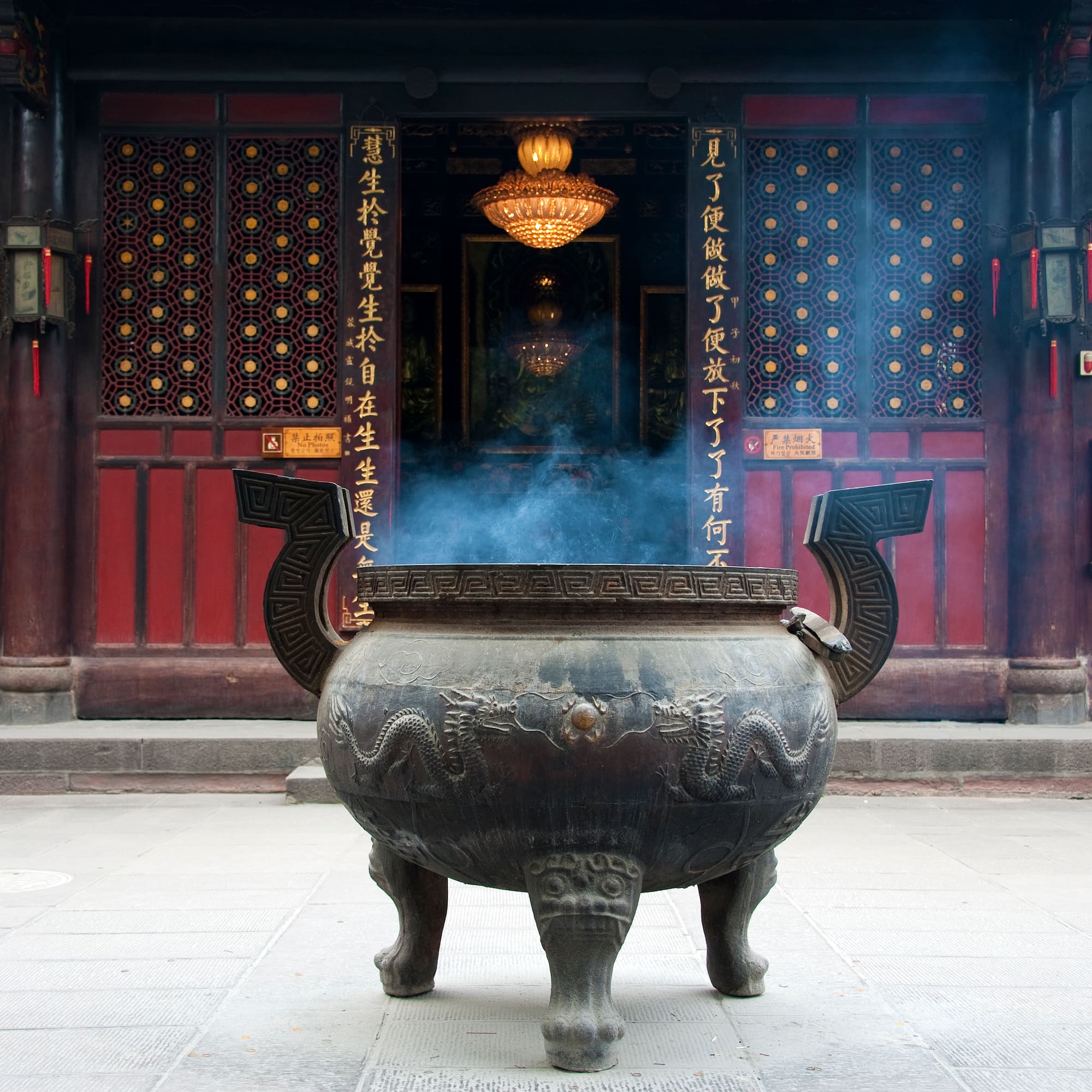 a large metal pot with a smoke coming out of it