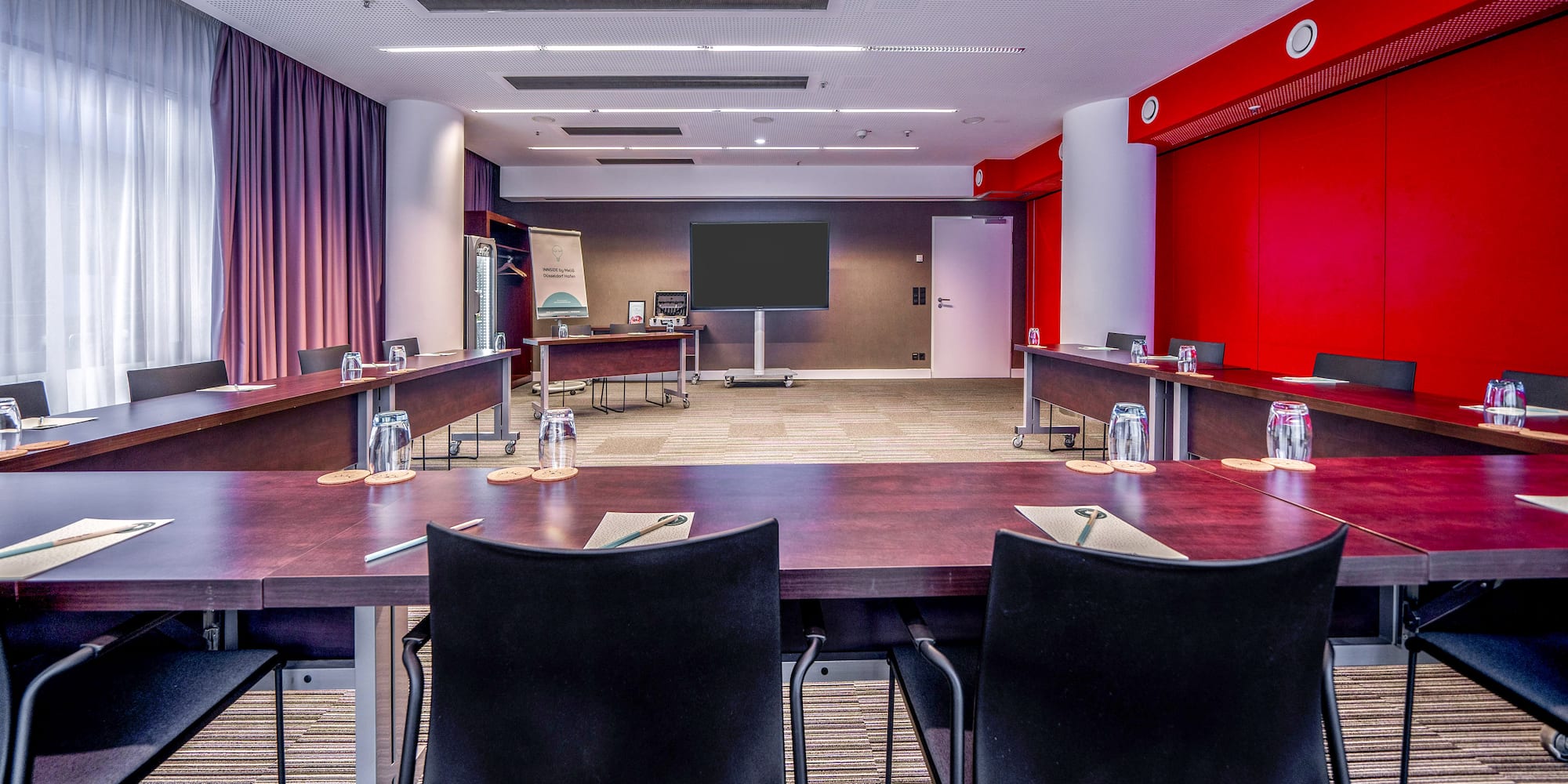 a room with a table and chairs