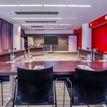 a room with a table and chairs