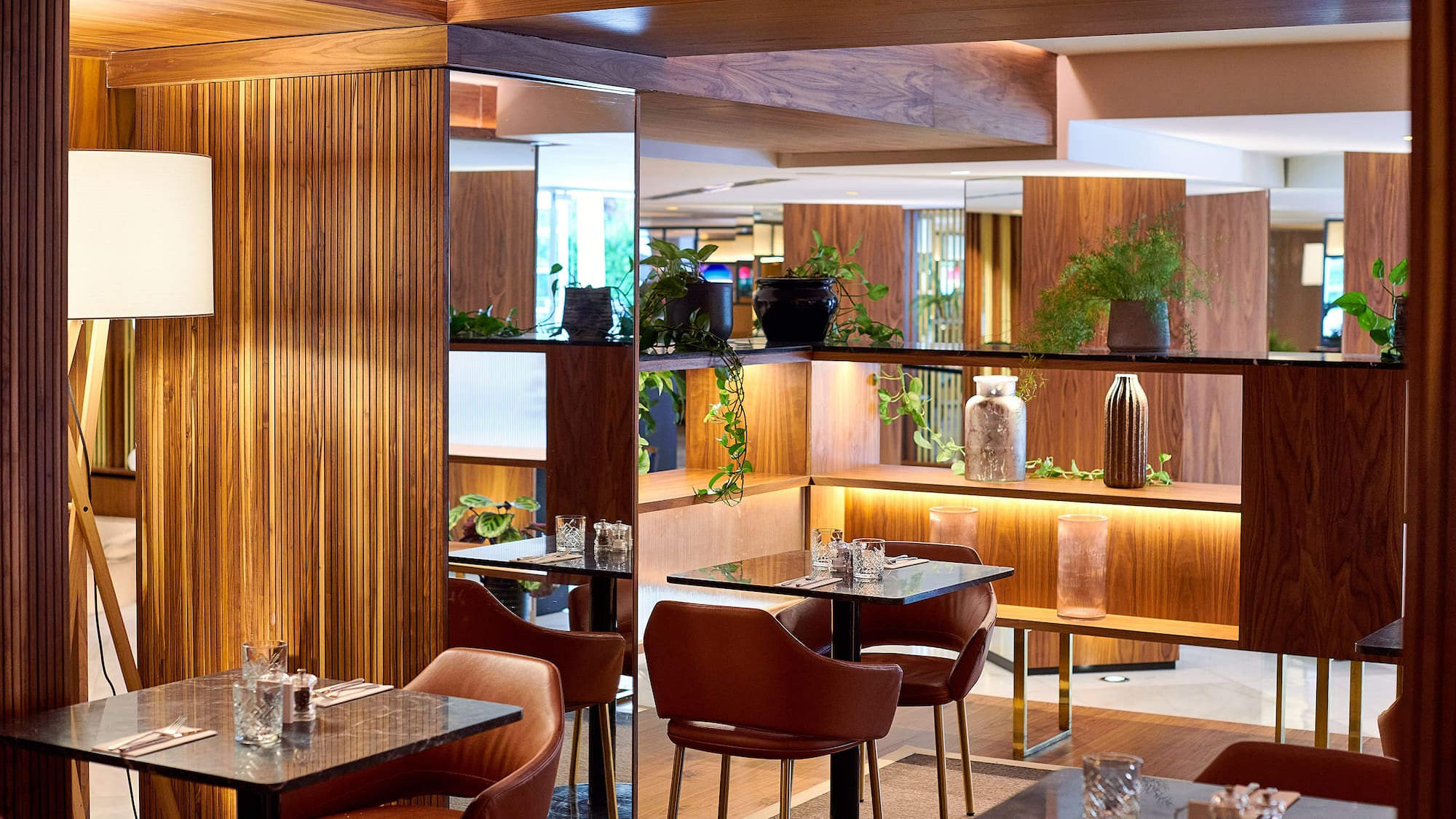 a room with tables and chairs