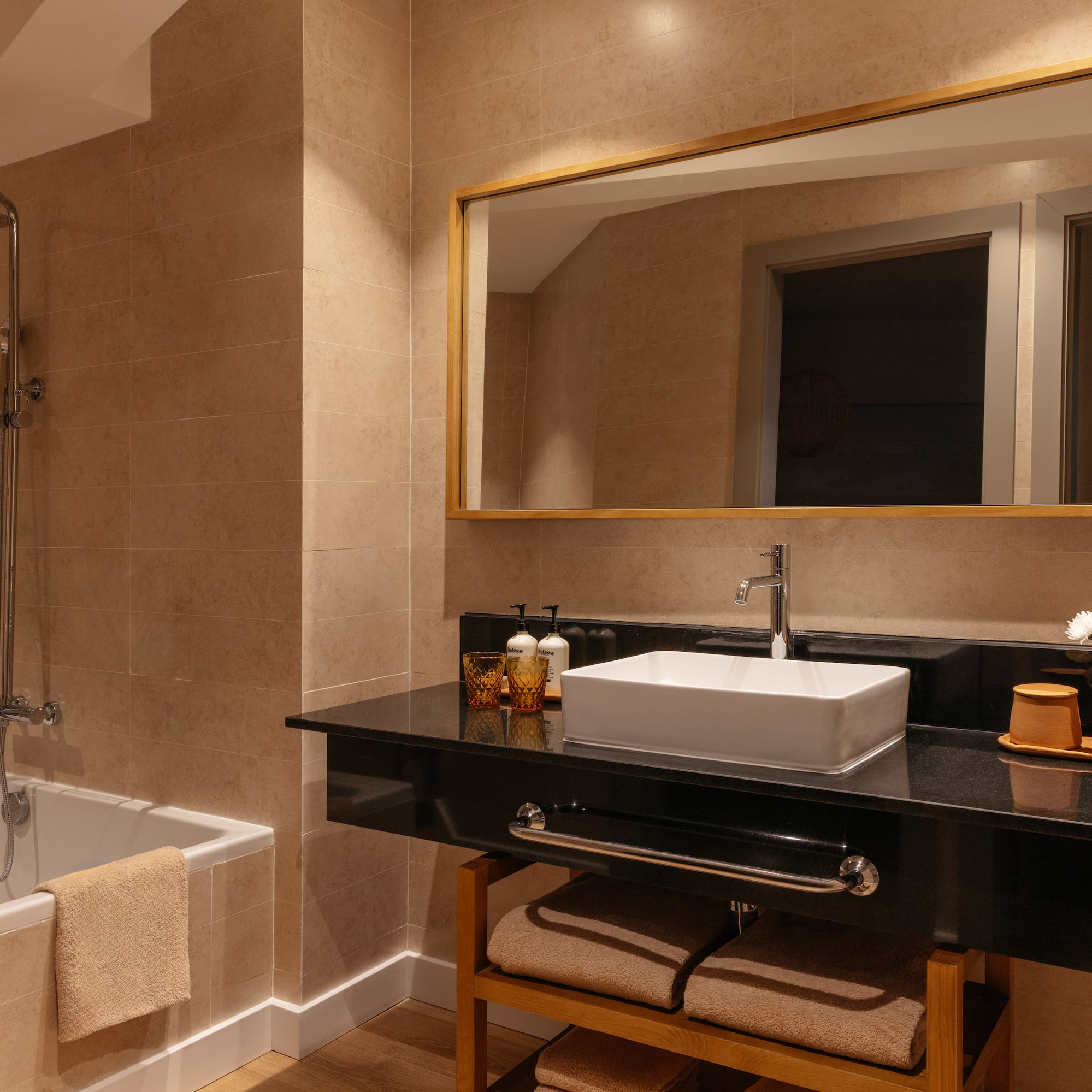 a bathroom with a sink and a bathtub