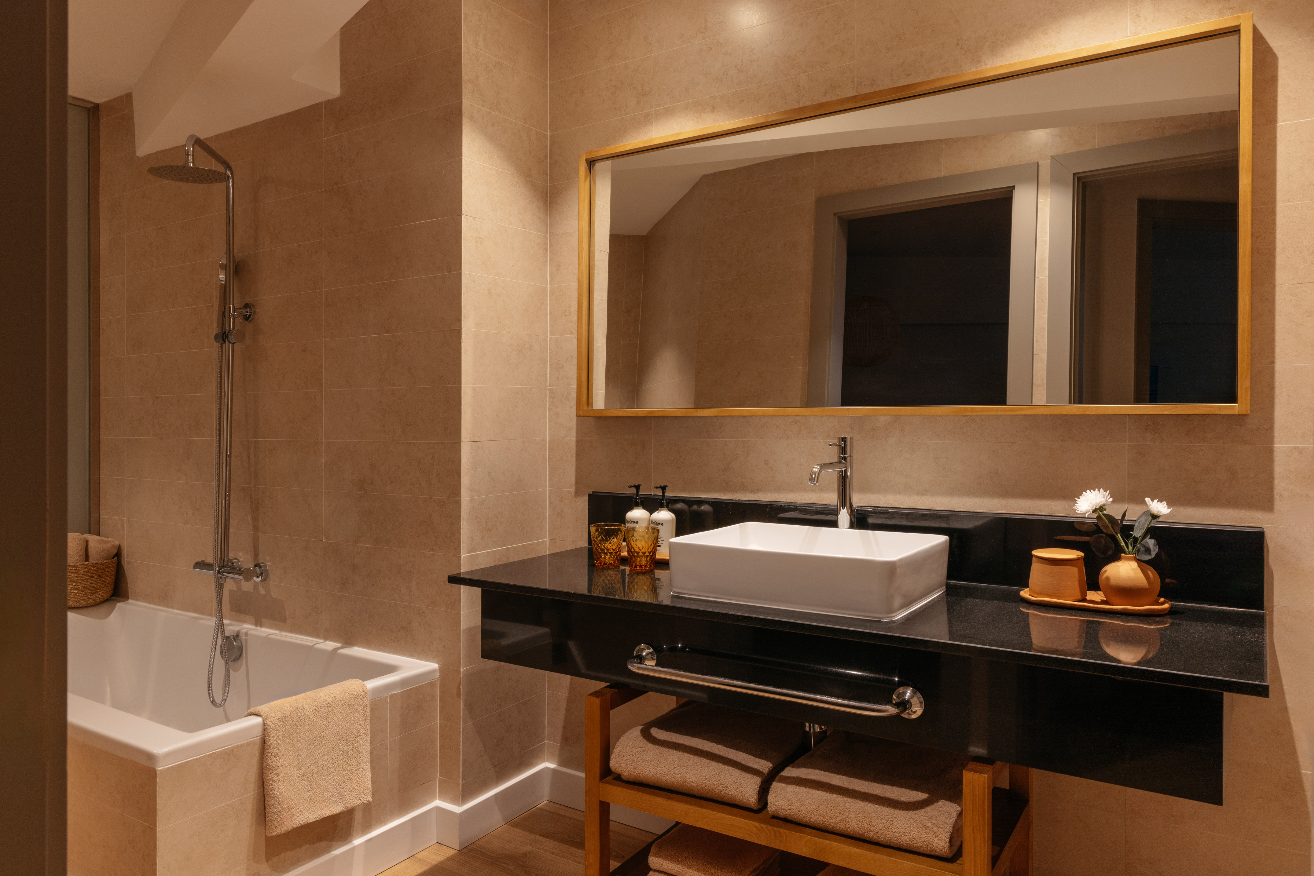 a bathroom with a sink and a bathtub