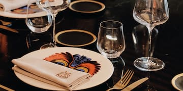 a table with plates and glasses