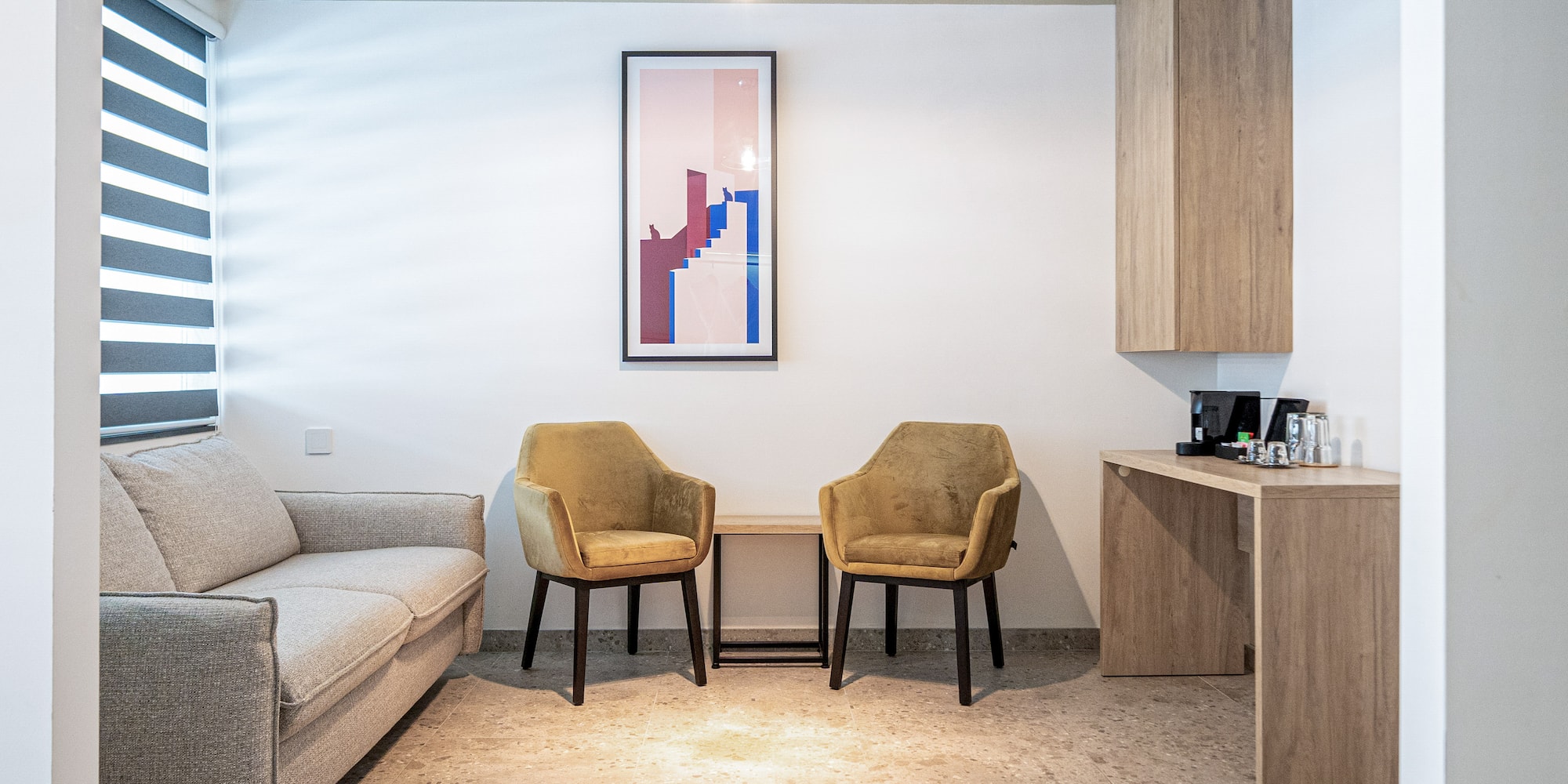 a room with a table and chairs