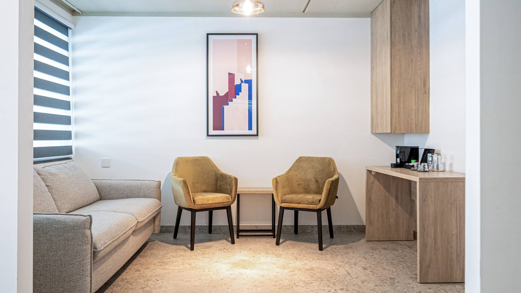 a room with a table and chairs