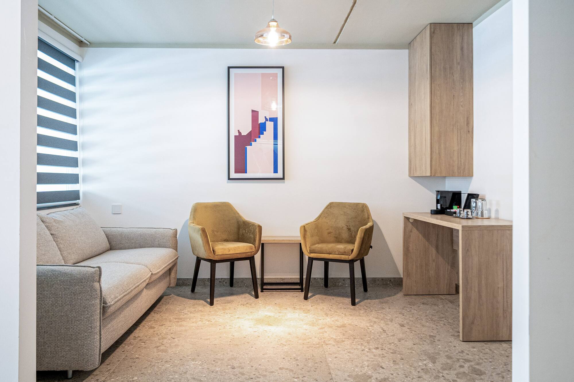 a room with a table and chairs