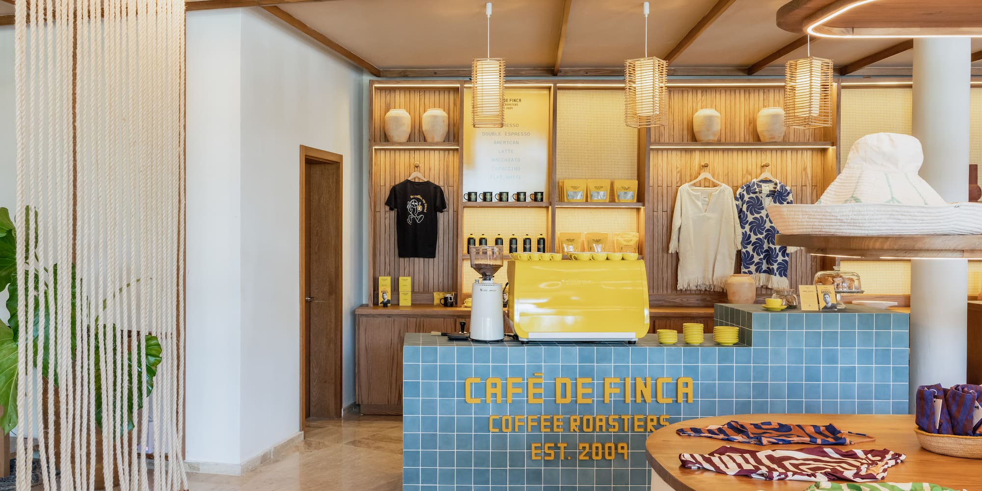 a coffee shop with a counter and a round table