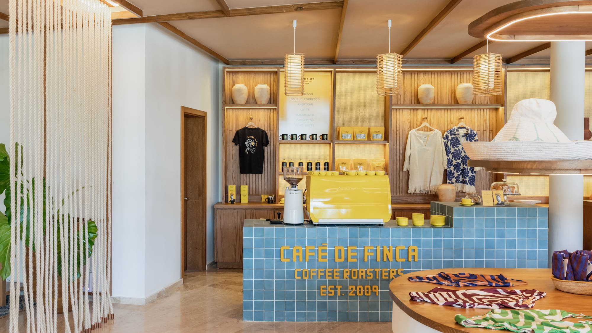 a coffee shop with a counter and a round table