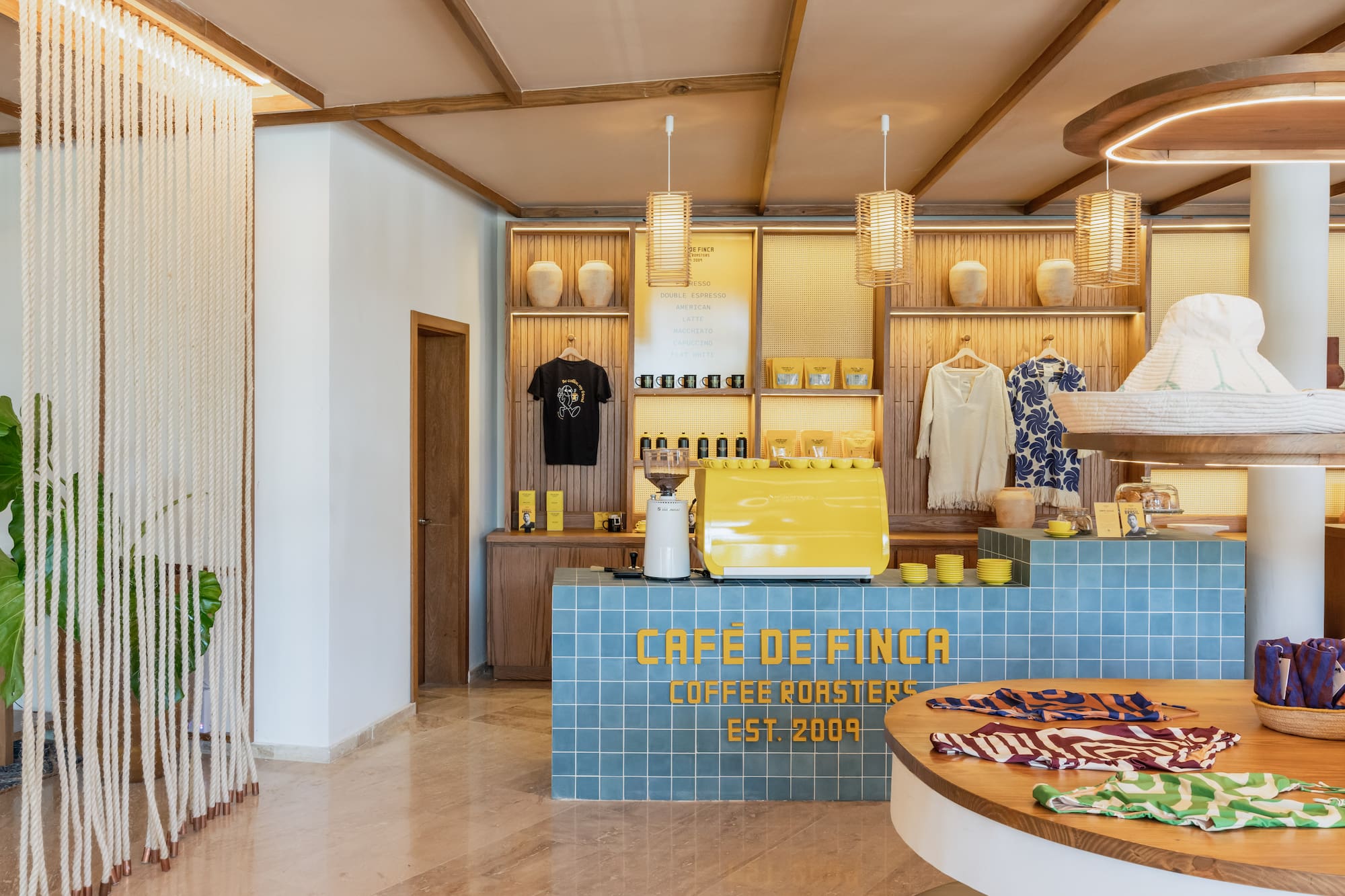 a coffee shop with a counter and a round table