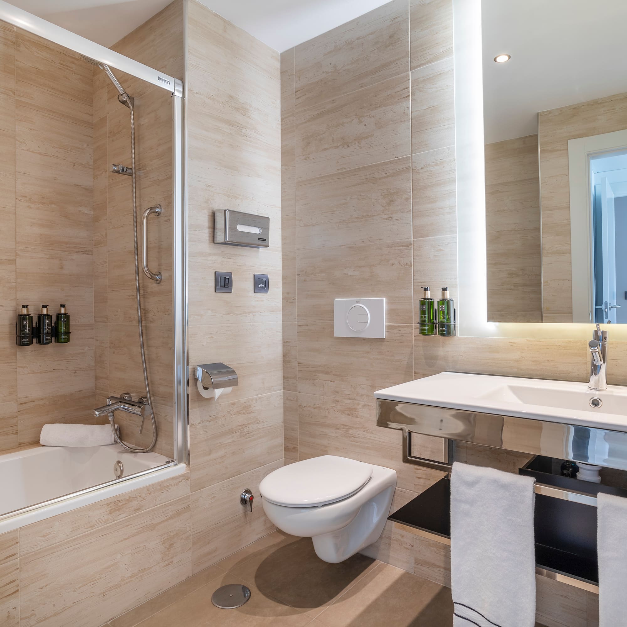 a bathroom with a sink and toilet