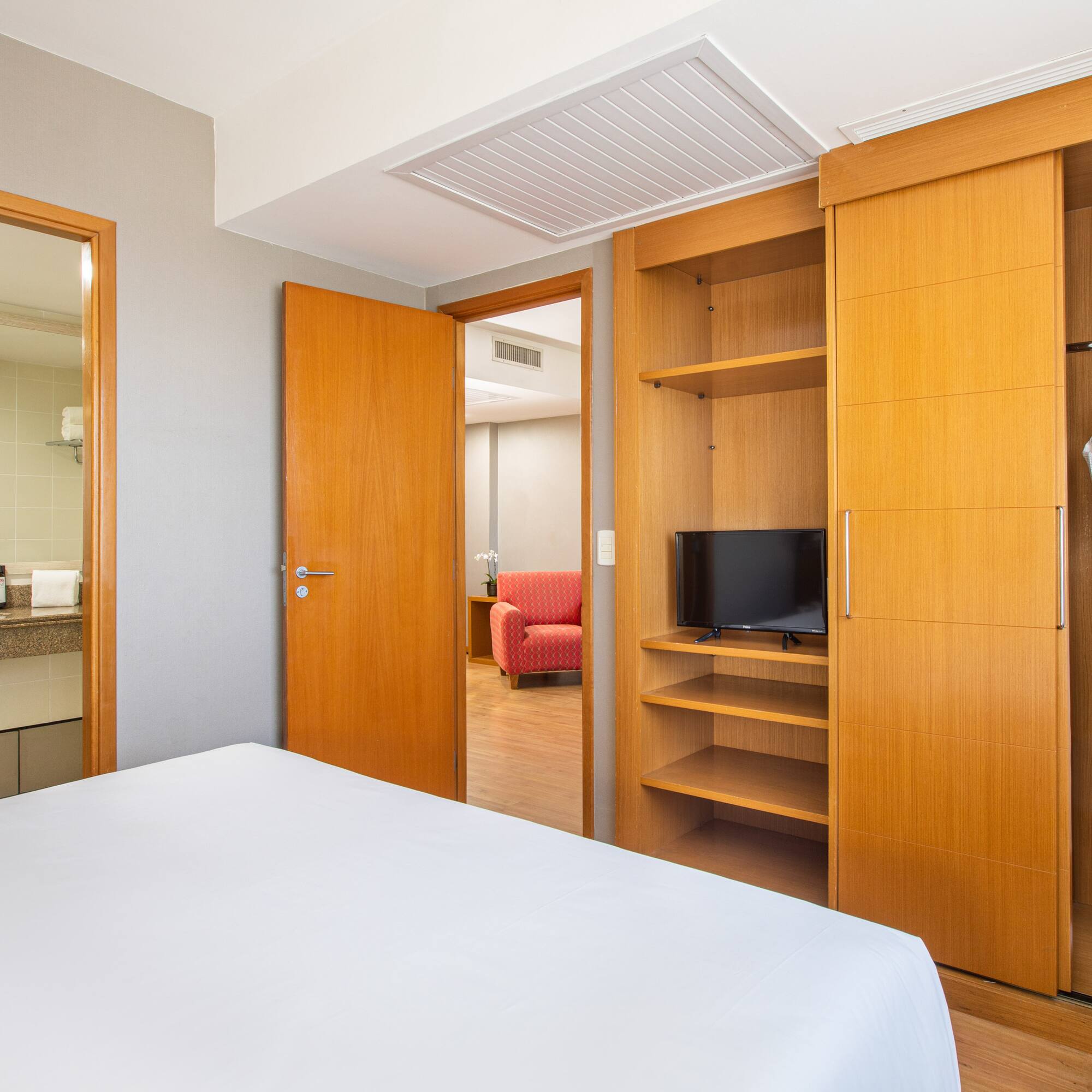 a room with a bed and a closet