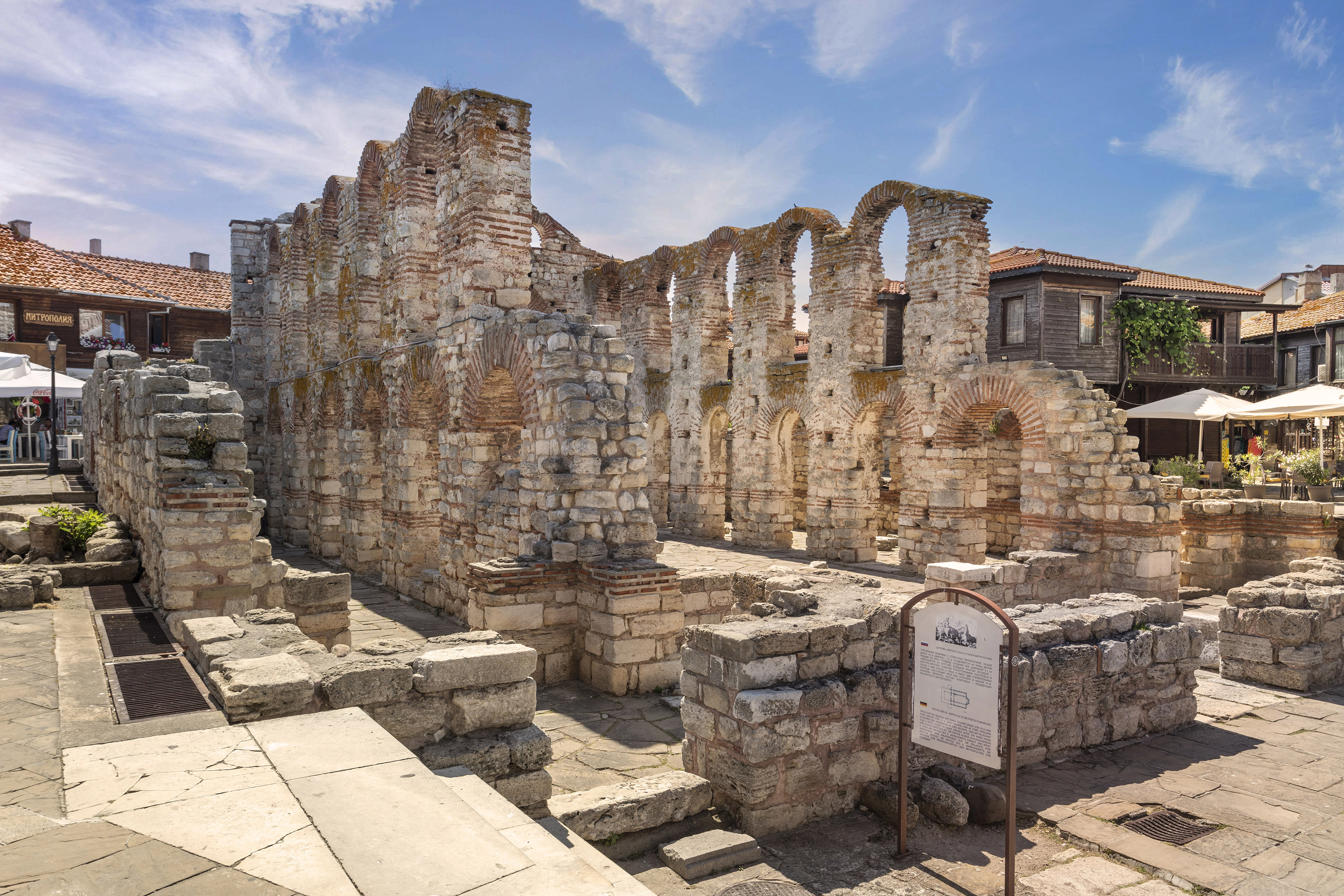 a stone building with arches