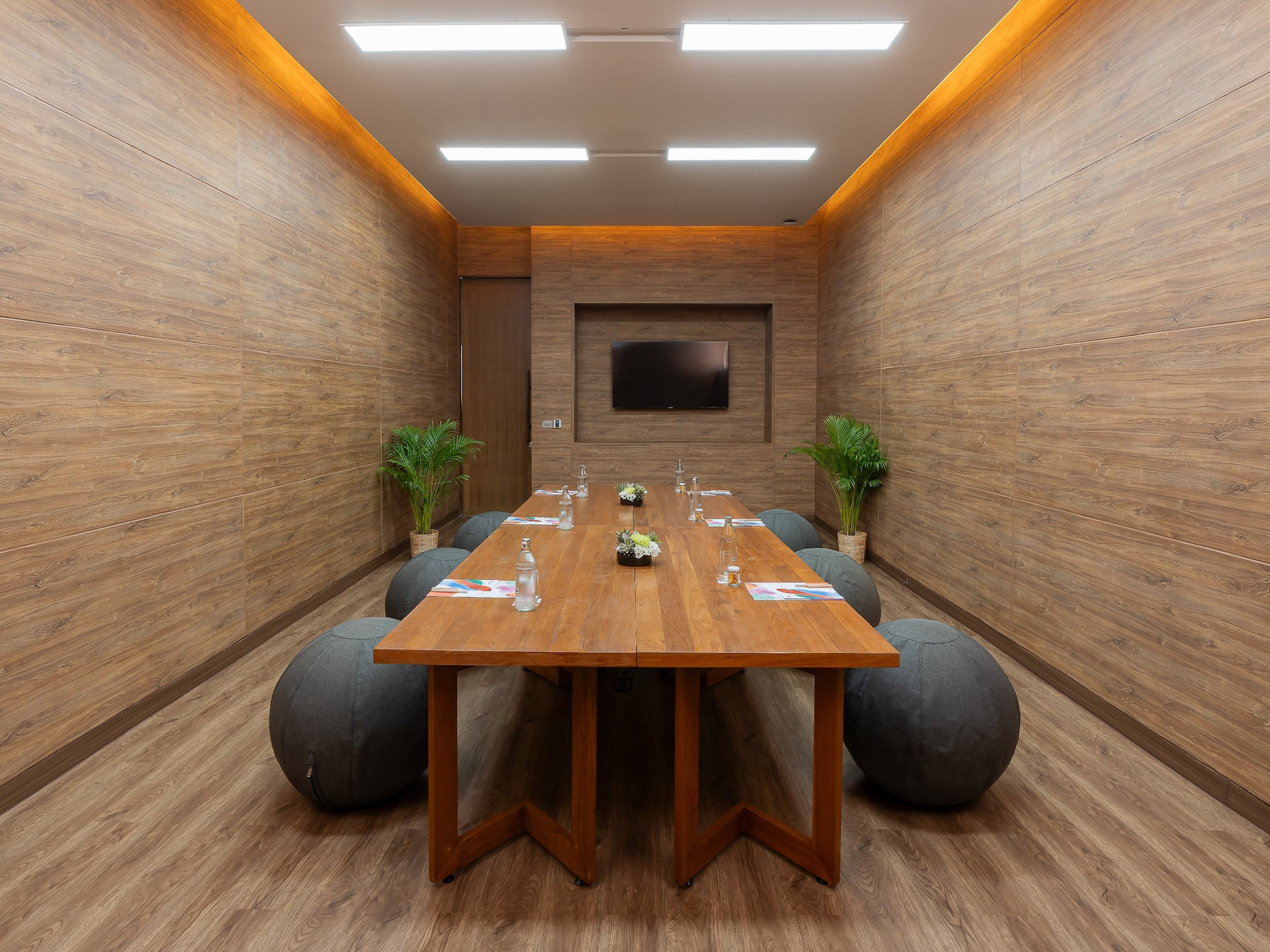 a room with a table and chairs