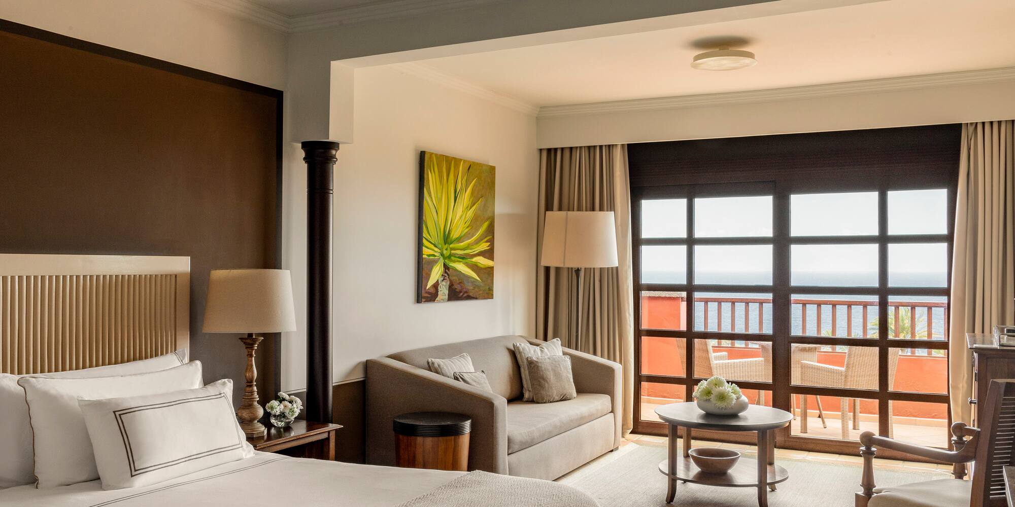 a room with a bed and a fireplace