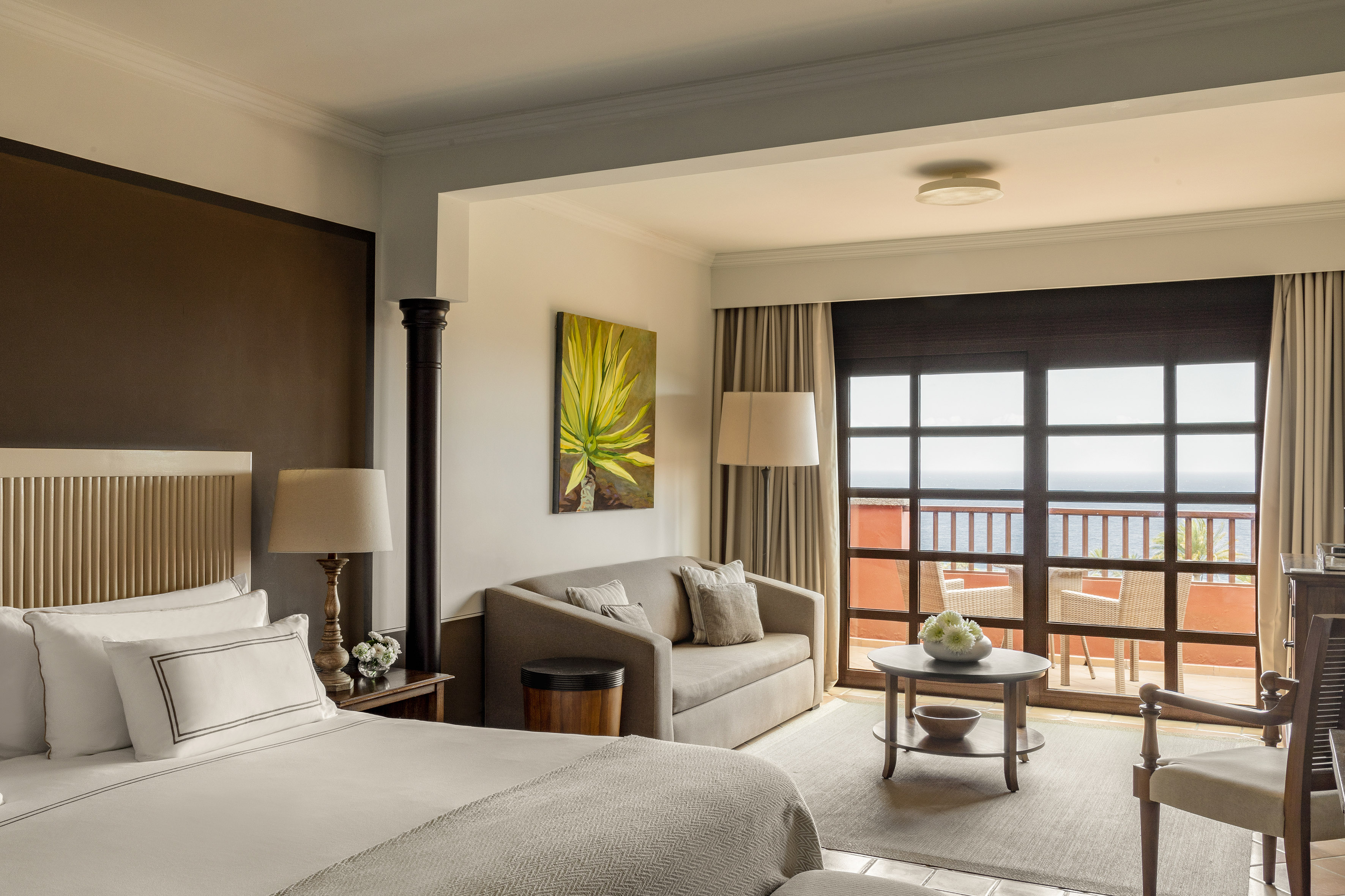 a room with a bed and a fireplace