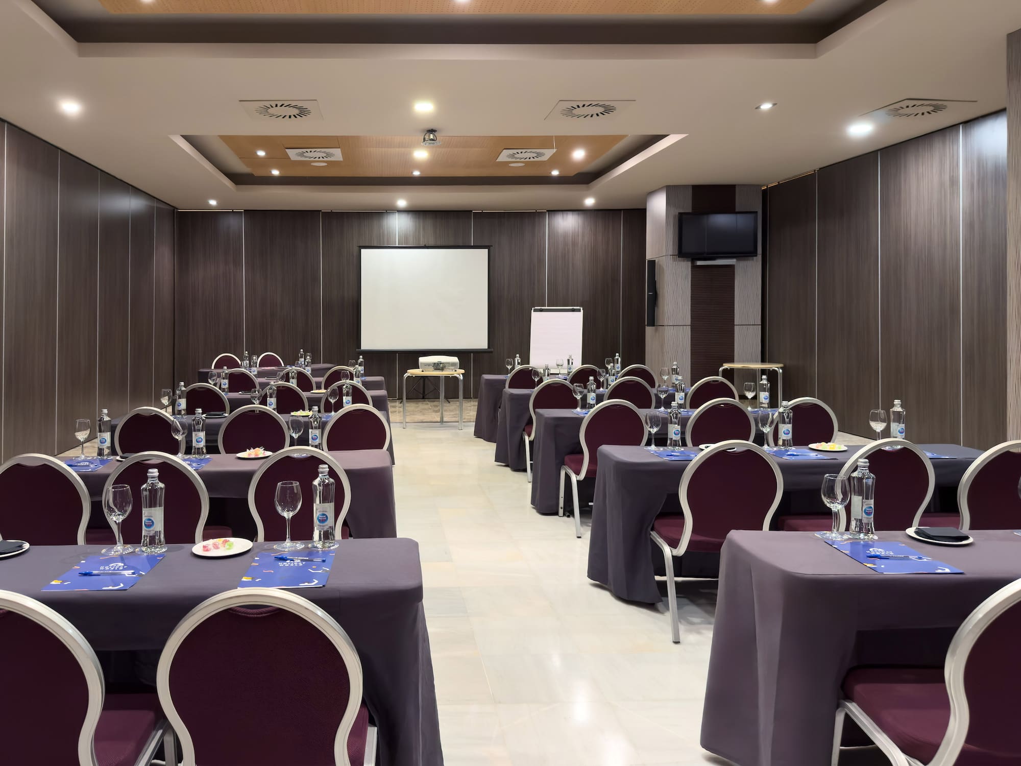 a room with tables and chairs