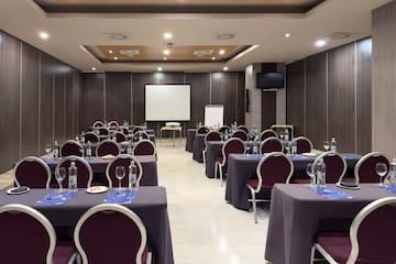 a room with tables and chairs