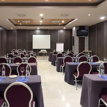 a room with tables and chairs