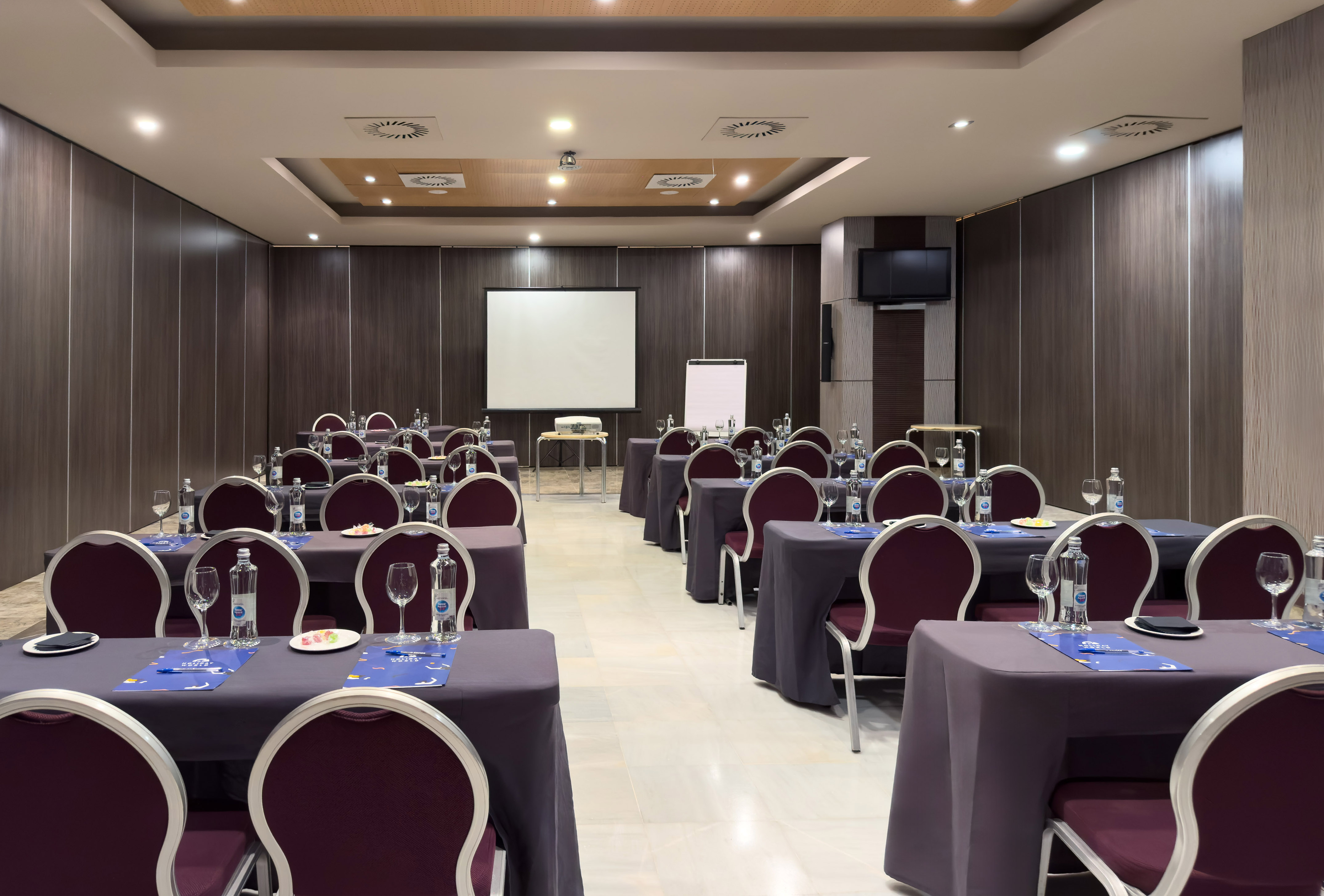 a room with tables and chairs