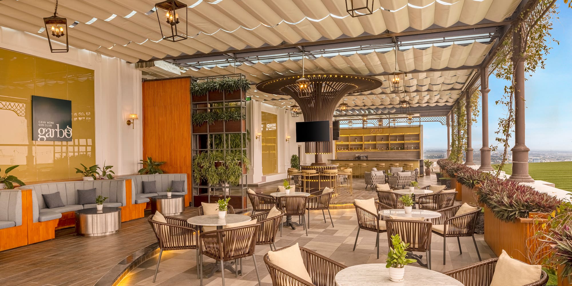 a patio with tables and chairs