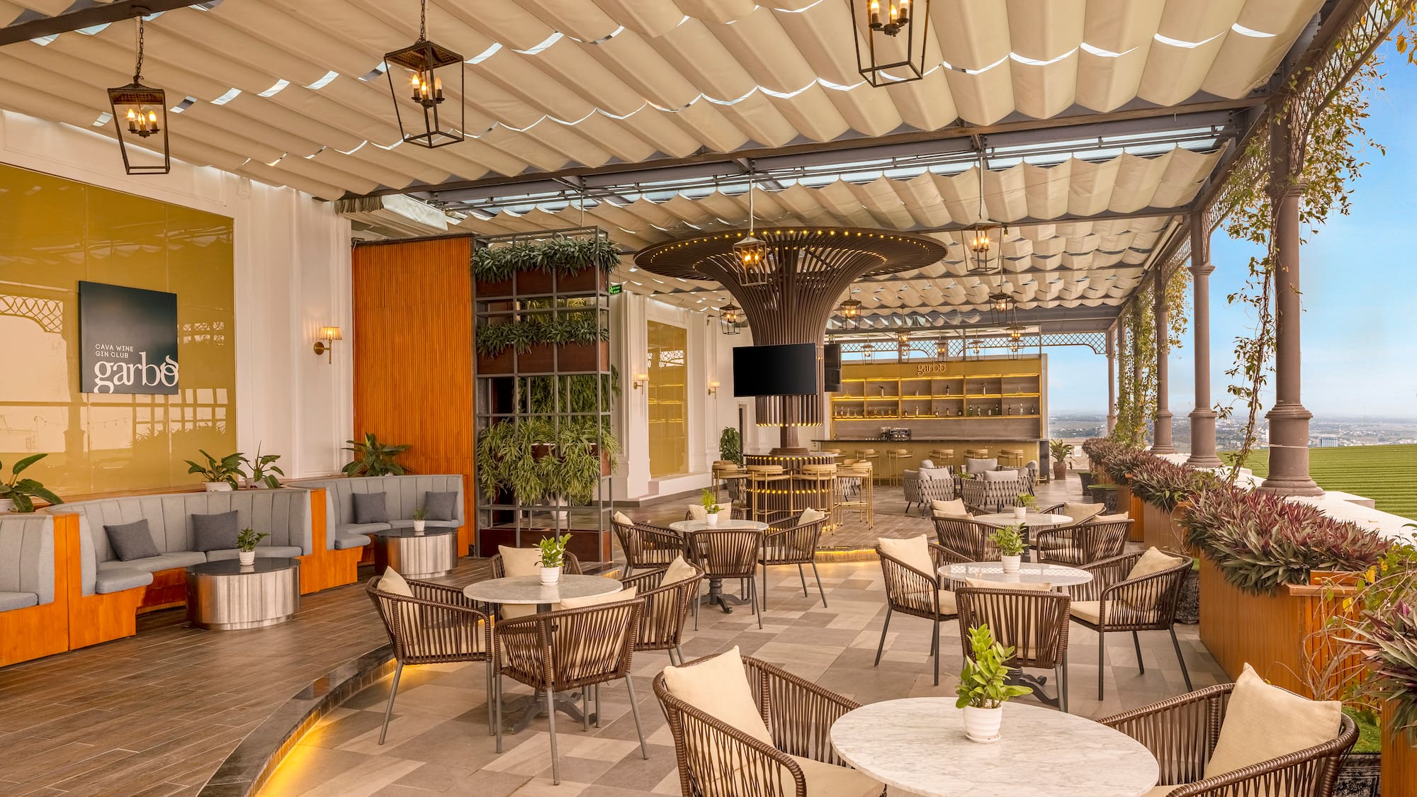 a patio with tables and chairs