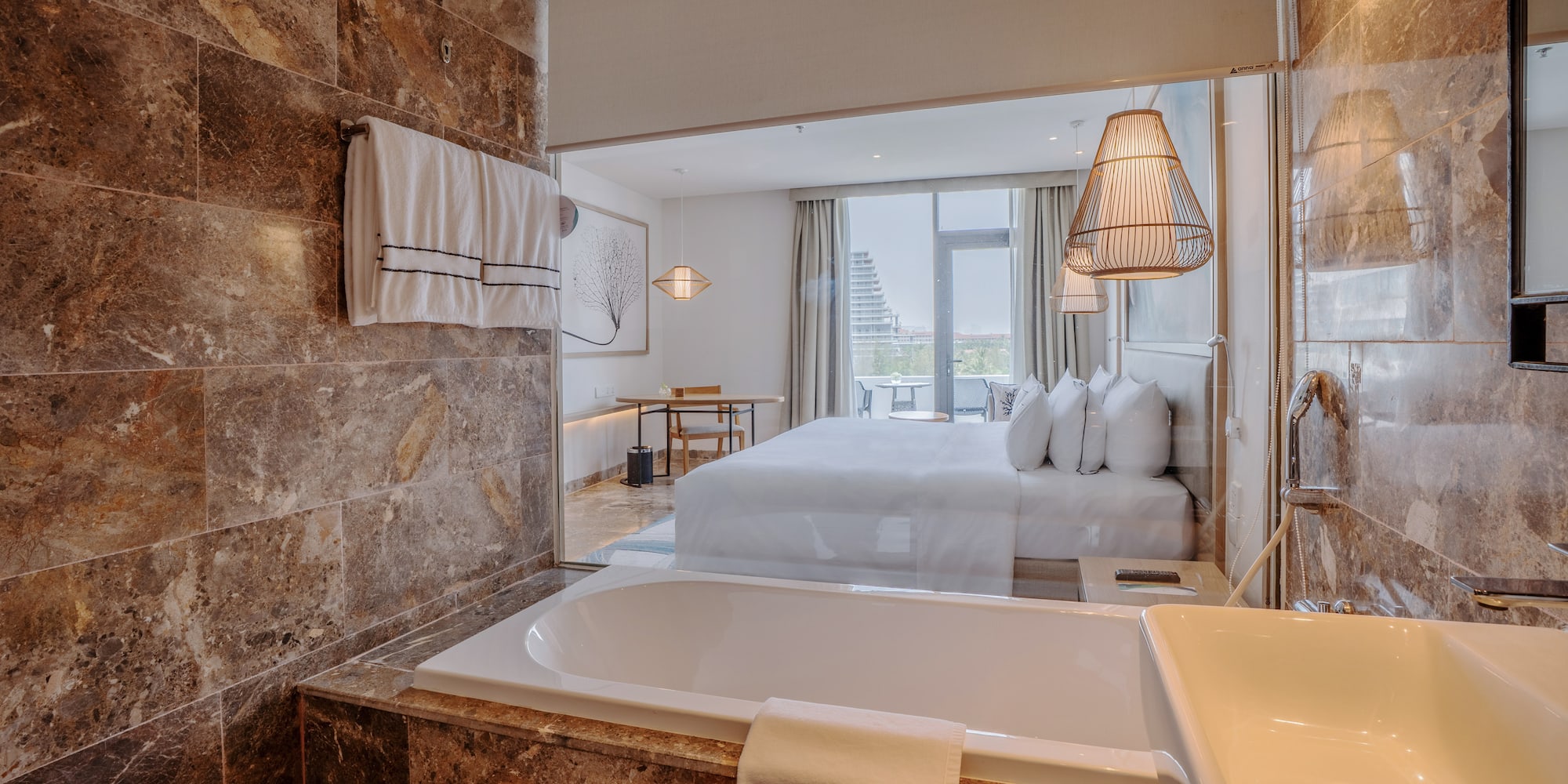 a bathroom with a bed and a bathtub