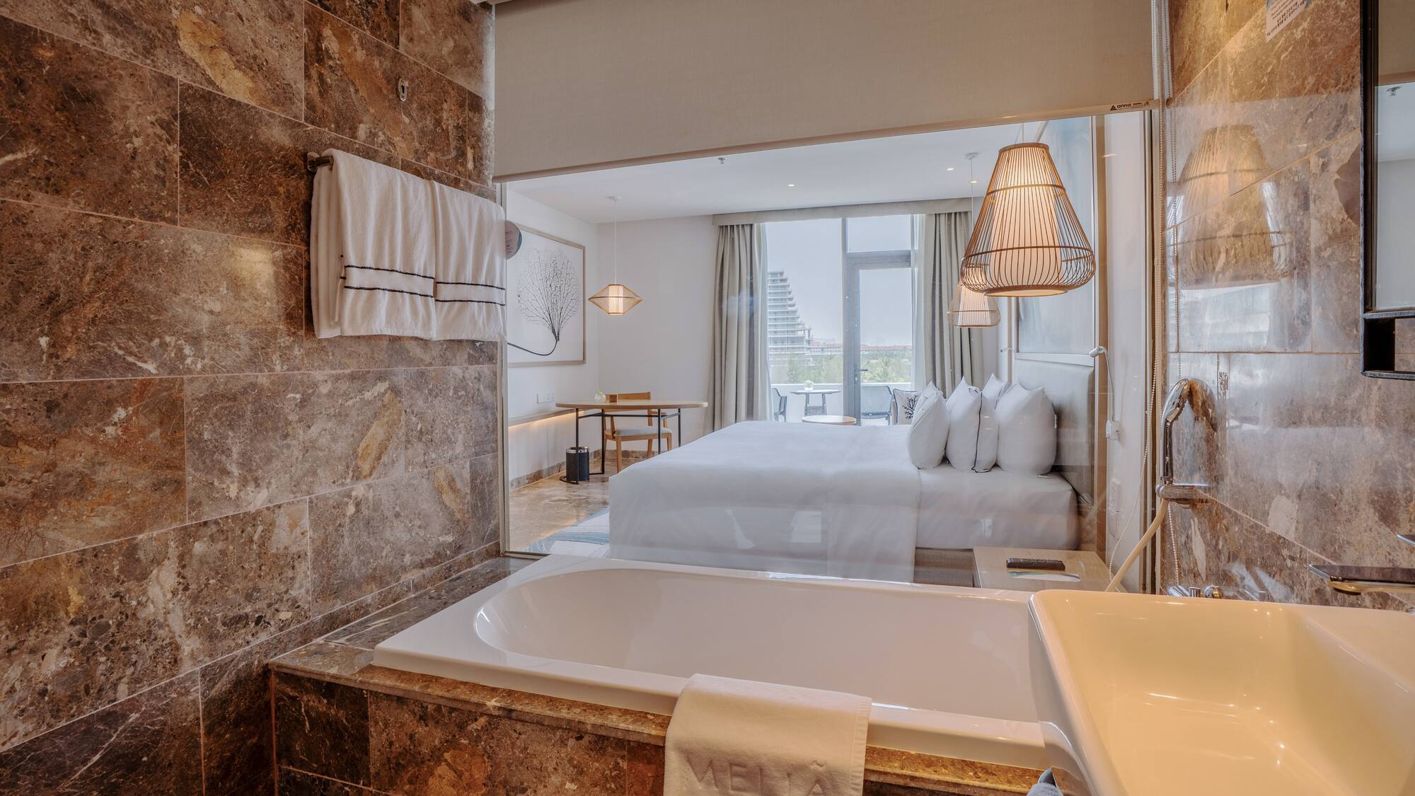 a bathroom with a bed and a bathtub