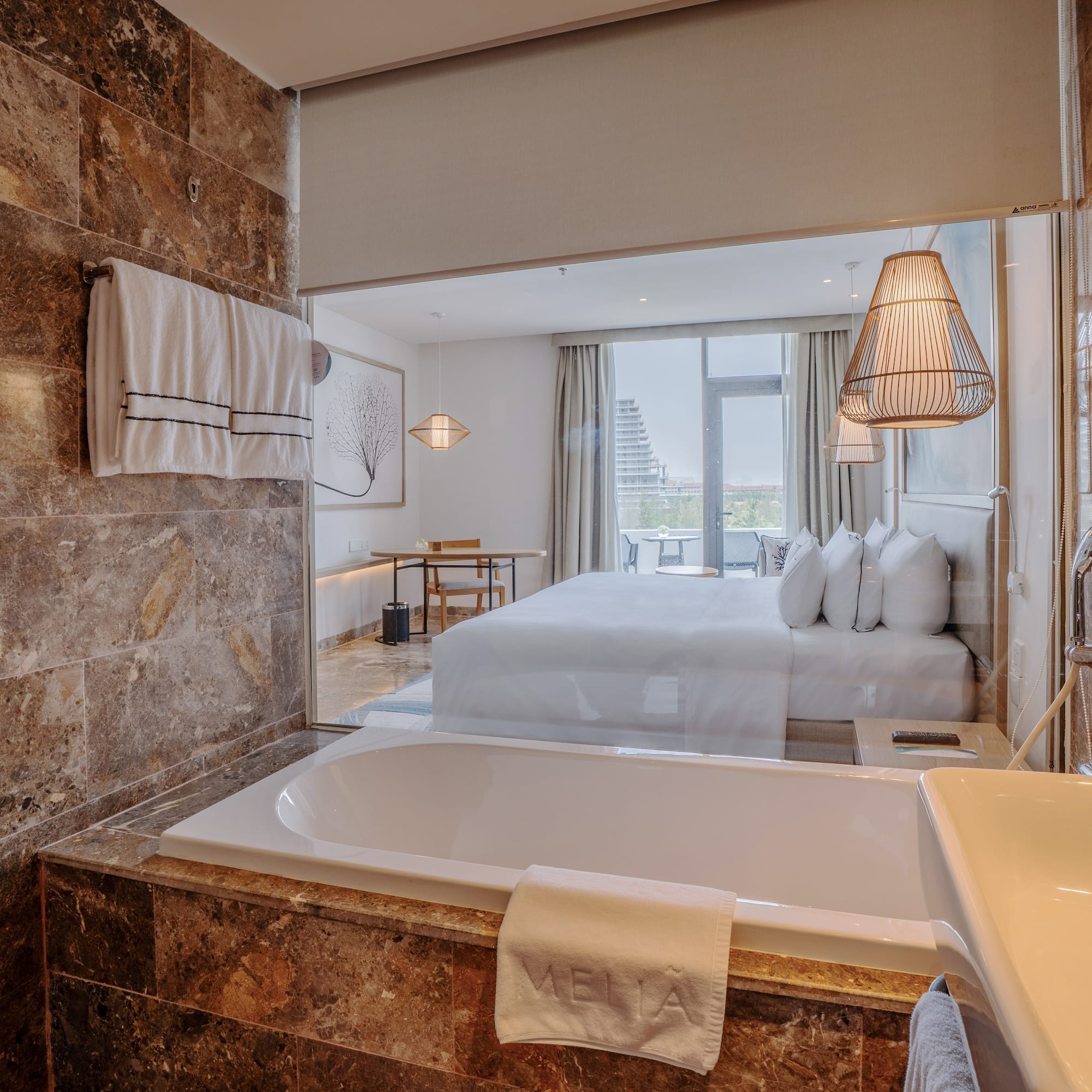 a bathroom with a bed and a bathtub