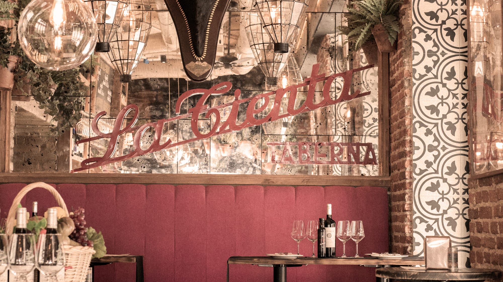 a restaurant with a bull head from the ceiling