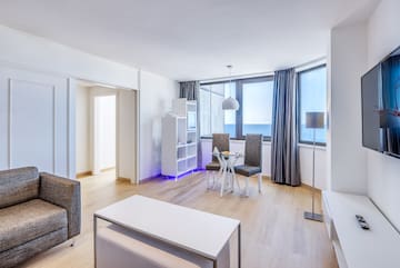 a room with a table and chairs